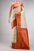 Off White Dual Tone Kanchipuram Silk Saree with Zari Brocade on the body and Zari Border.  displayed on a mannequin