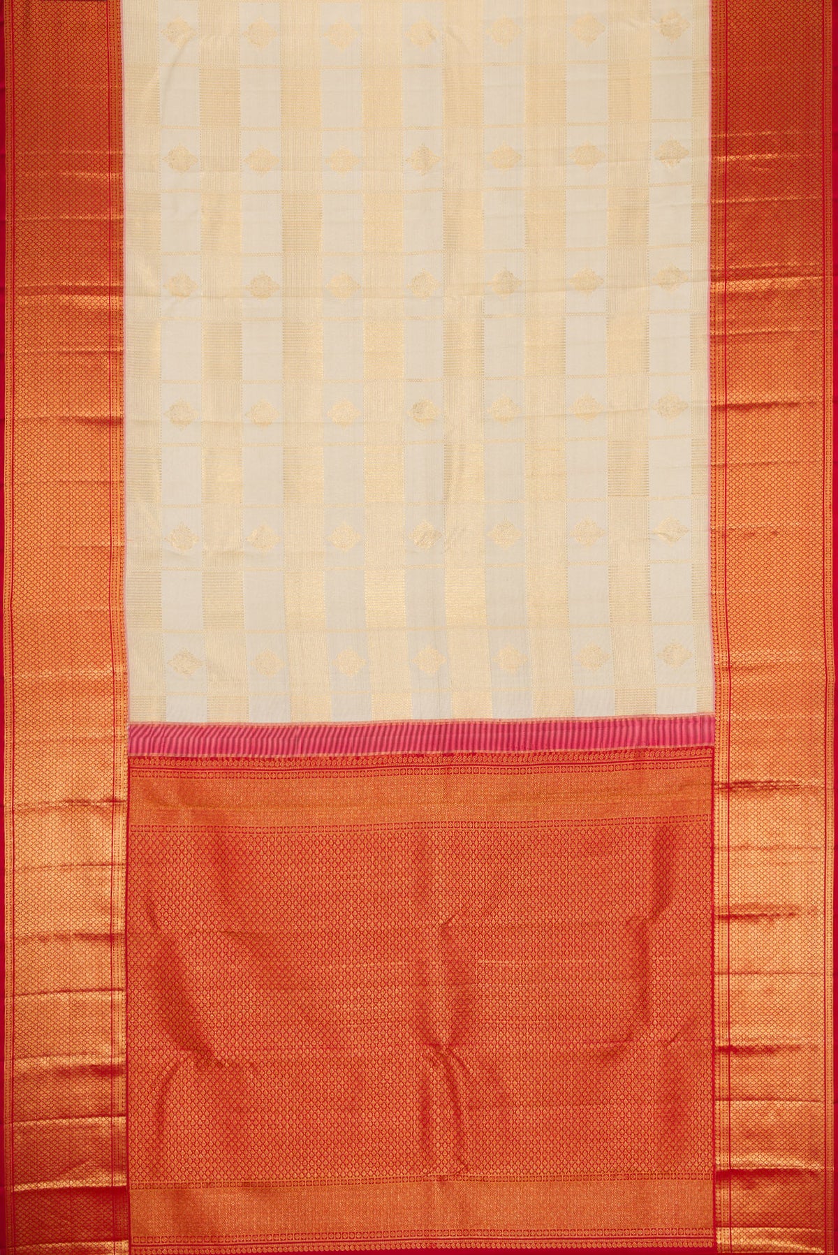 Flat view of Off White Dual Tone Kanchipuram Silk Saree with Zari Brocade on the body and Zari Border. 
