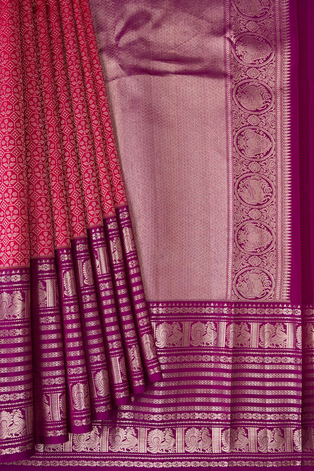 Pleats and pallu of Dark Pink Kanchipuram Silk Saree with Zari Brocade on the body and Fancy Border. 
