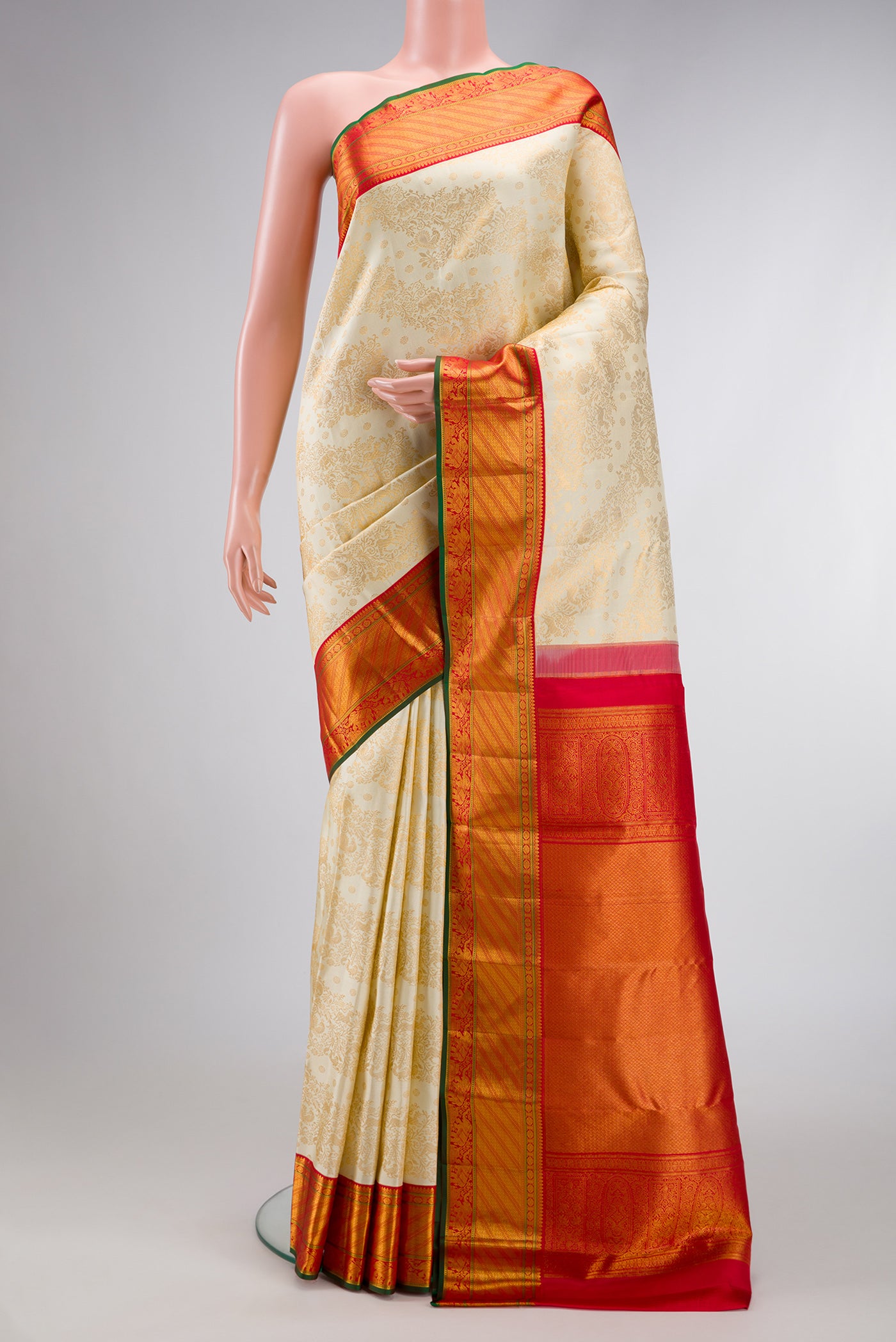 Off White Dual Tone Kanjivaram Silk Saree with Zari Brocade on the body and Zari Border.  displayed on a mannequin