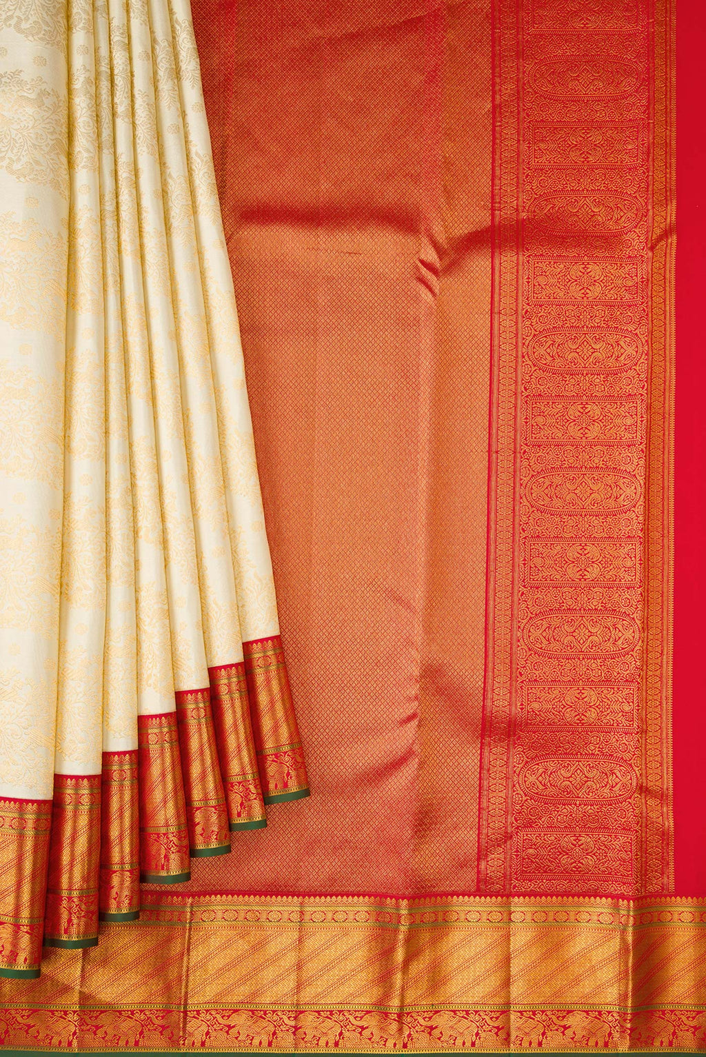 Pleats and pallu of Off White Dual Tone Kanjivaram Silk Saree with Zari Brocade on the body and Zari Border. 