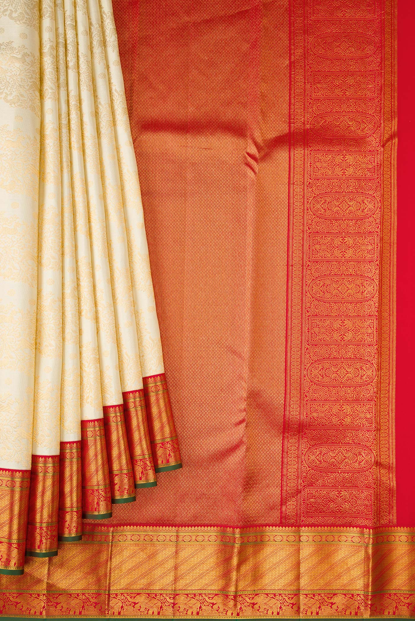 Pleats and pallu of Off White Dual Tone Kanjivaram Silk Saree with Zari Brocade on the body and Zari Border. 