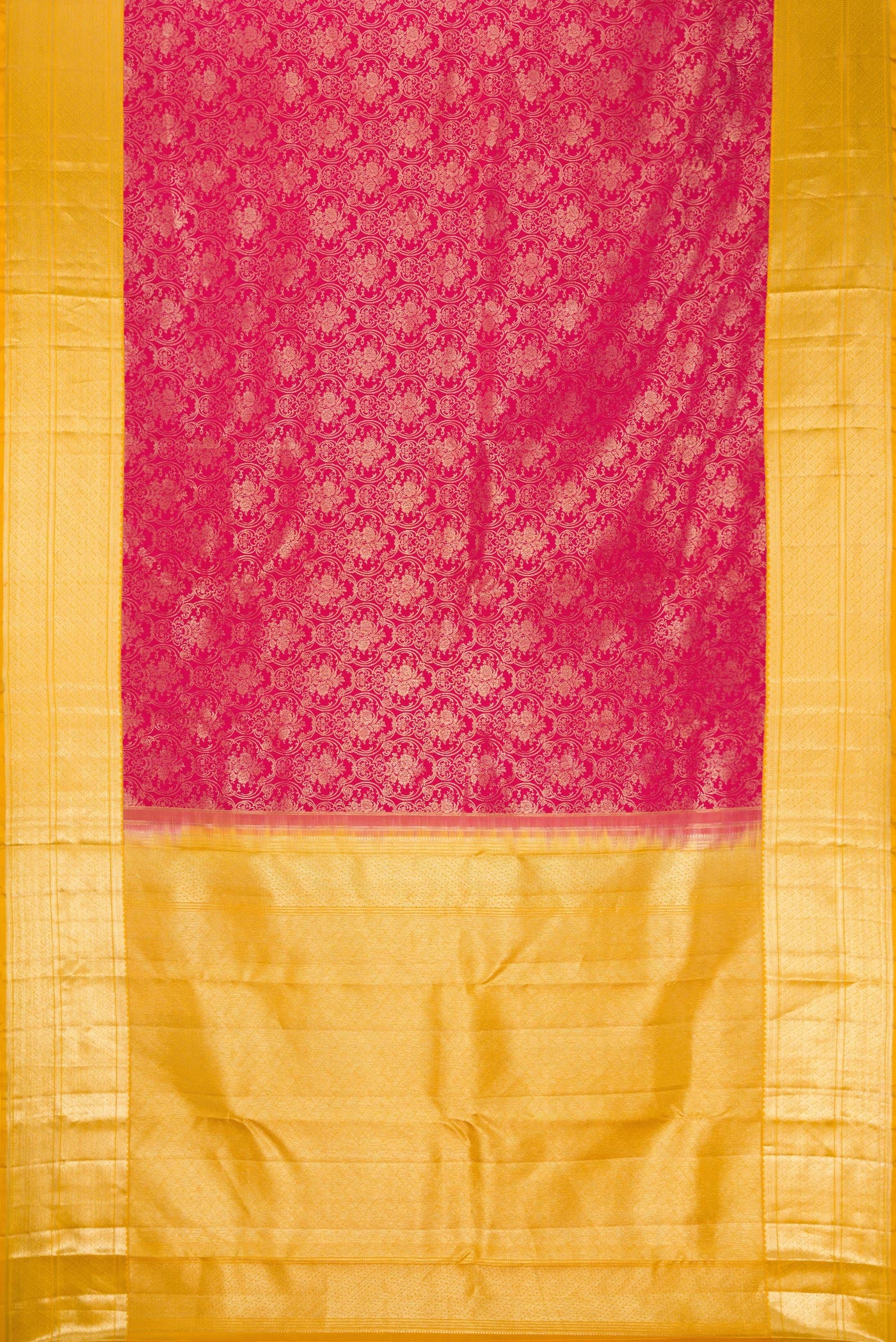 Flat view of Pink Dual Tone Kanjivaram Silk Saree with Zari Brocade on the body and Zari Border. 