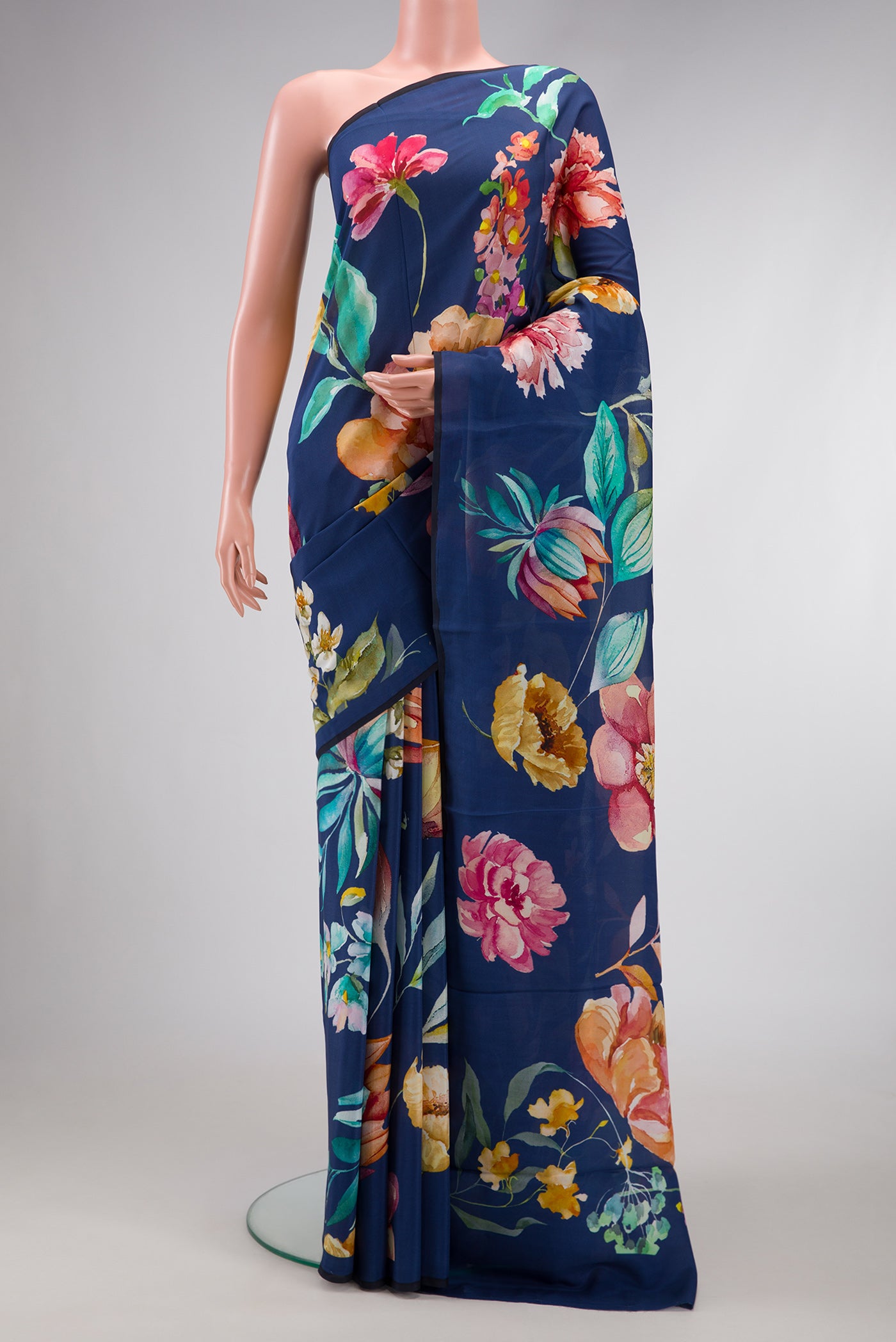 Navy Blue Dual Tone Mysore Crepe Saree with Printed design on the body and Without Border.  displayed on a mannequin