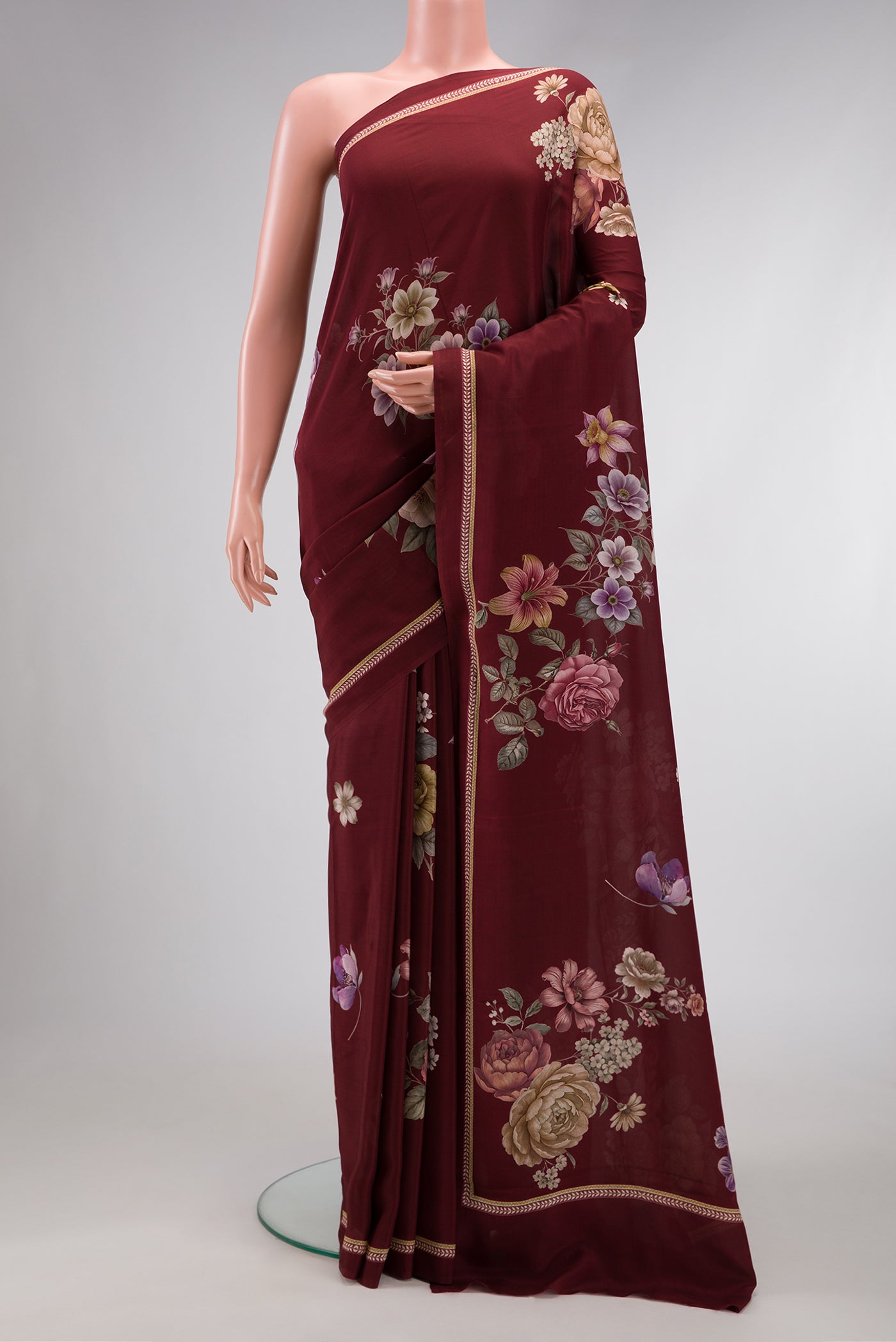 Brown Dual Tone Mysore Crepe Saree with Printed design on the body and Printed Border.  displayed on a mannequin