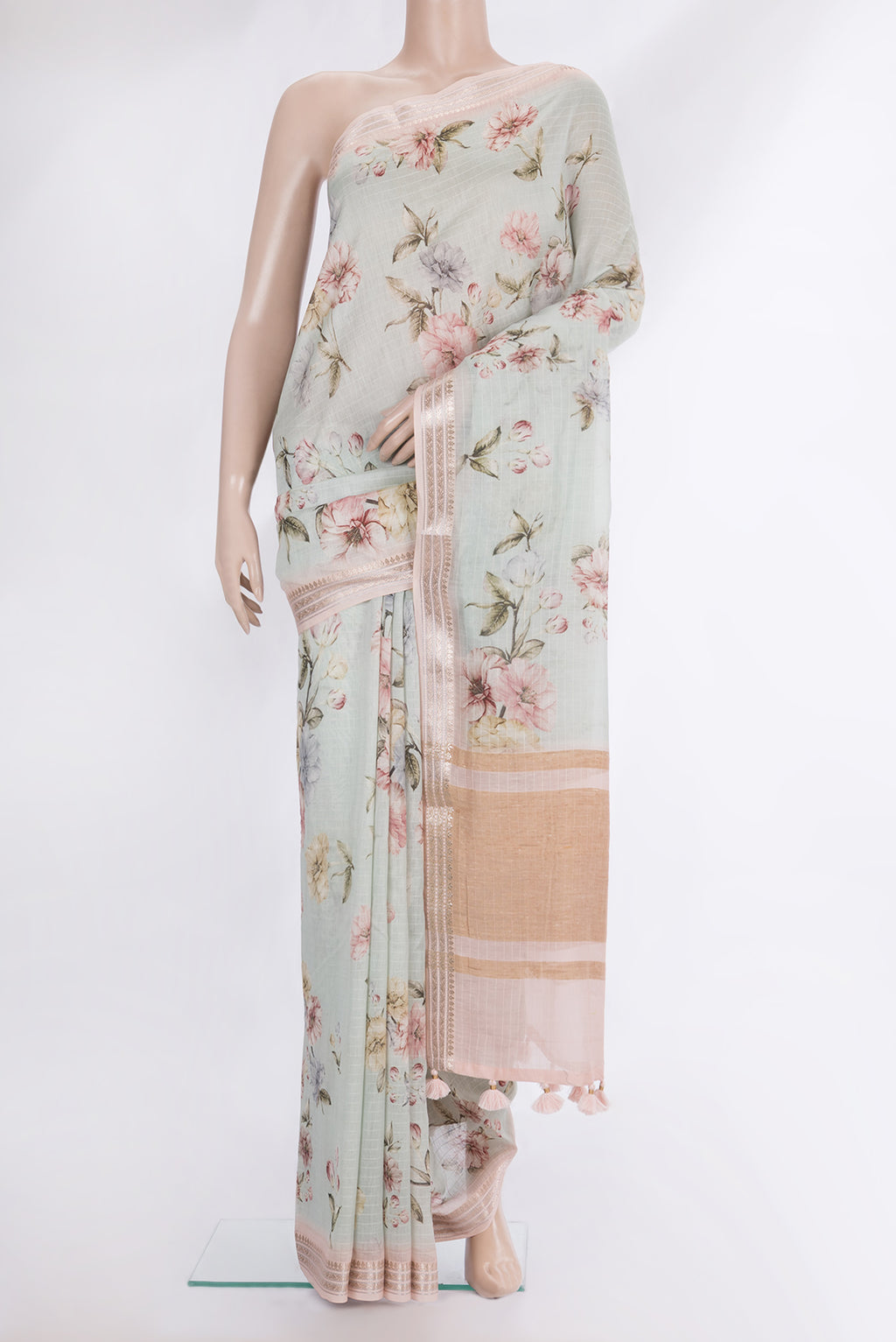 Pure Silk Pista Green Dual Tone Chanderi Saree with Printed design on the body and Zari And Thread Border.  displayed on a mannequin