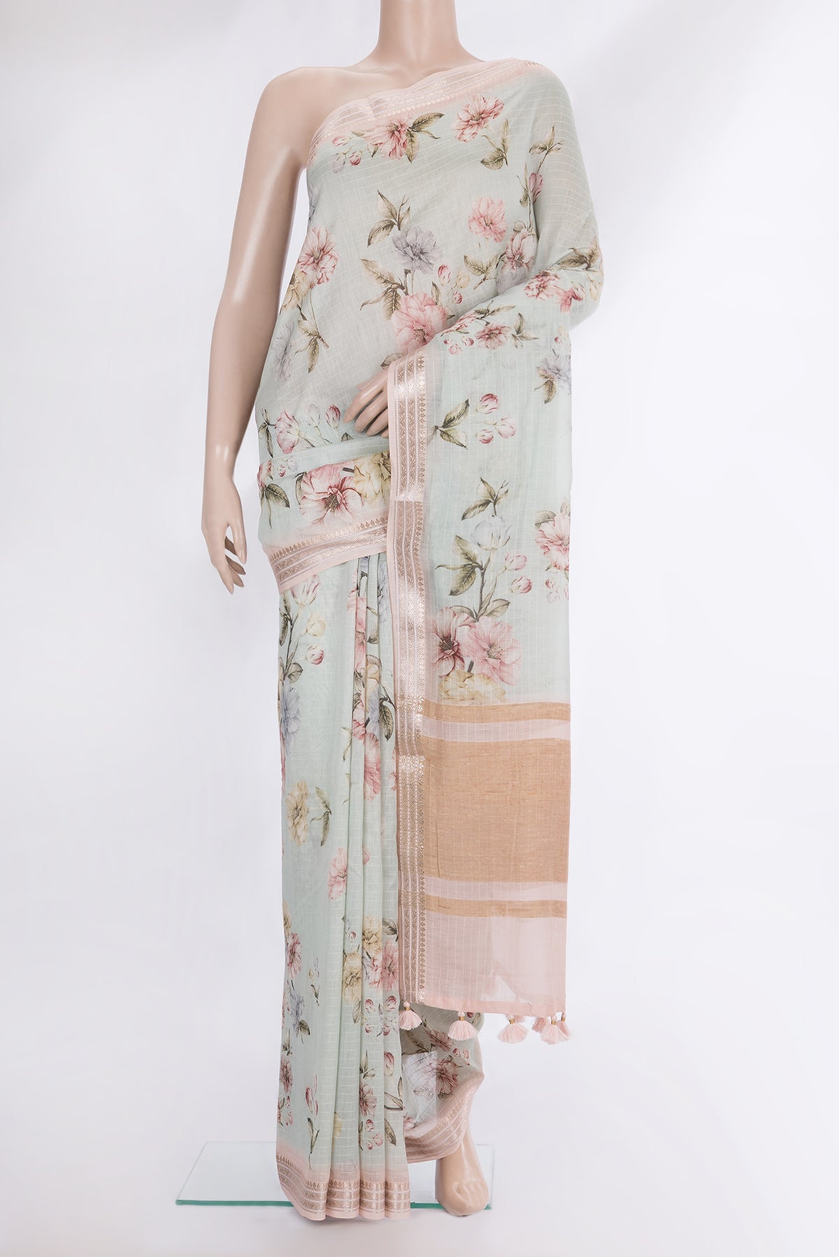 Pure Silk Pista Green Dual Tone Chanderi Saree with Printed design on the body and Zari And Thread Border.  displayed on a mannequin