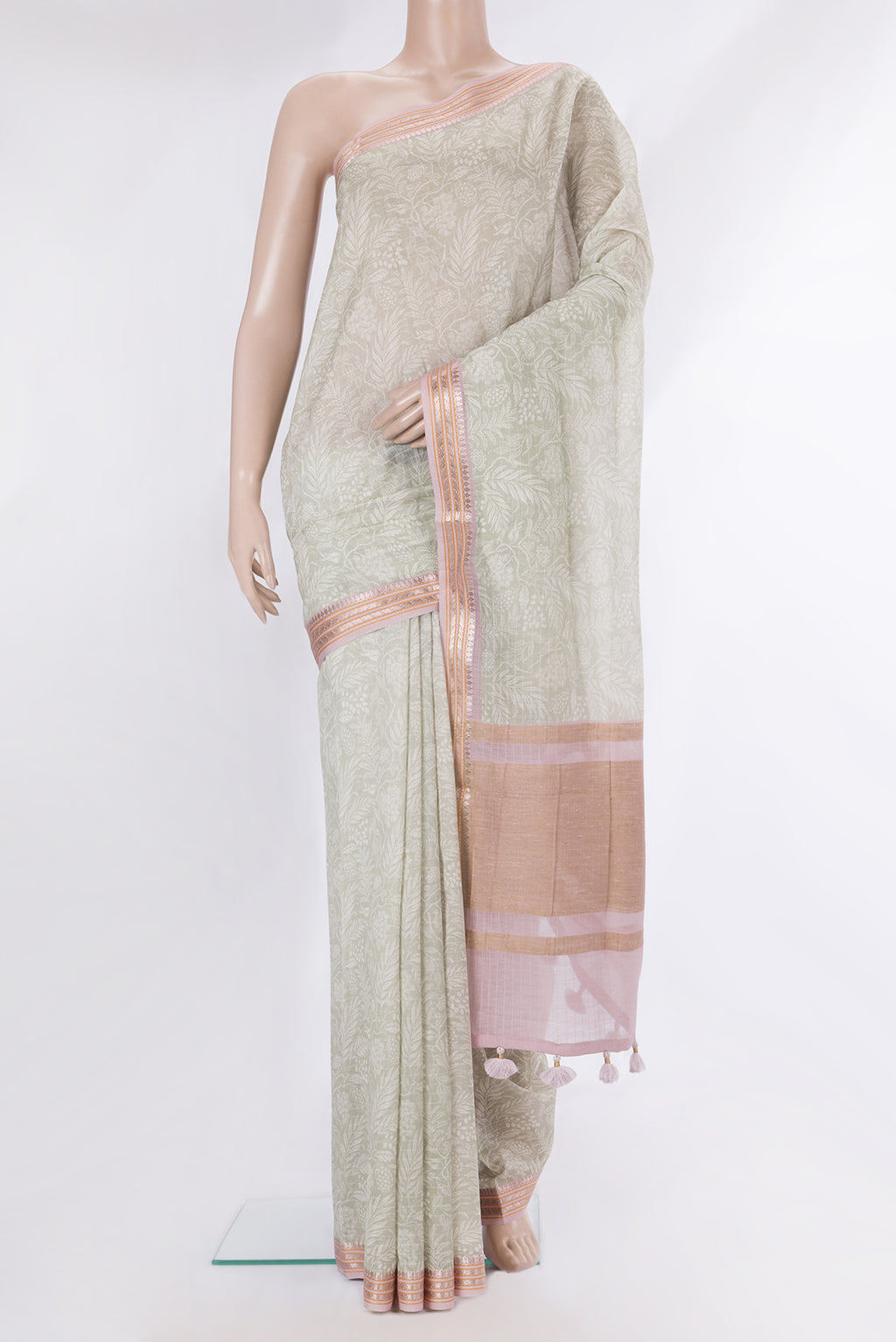 Pure Silk Pista Green Dual Tone Chanderi Saree with Printed design on the body and Zari And Thread Border.  displayed on a mannequin