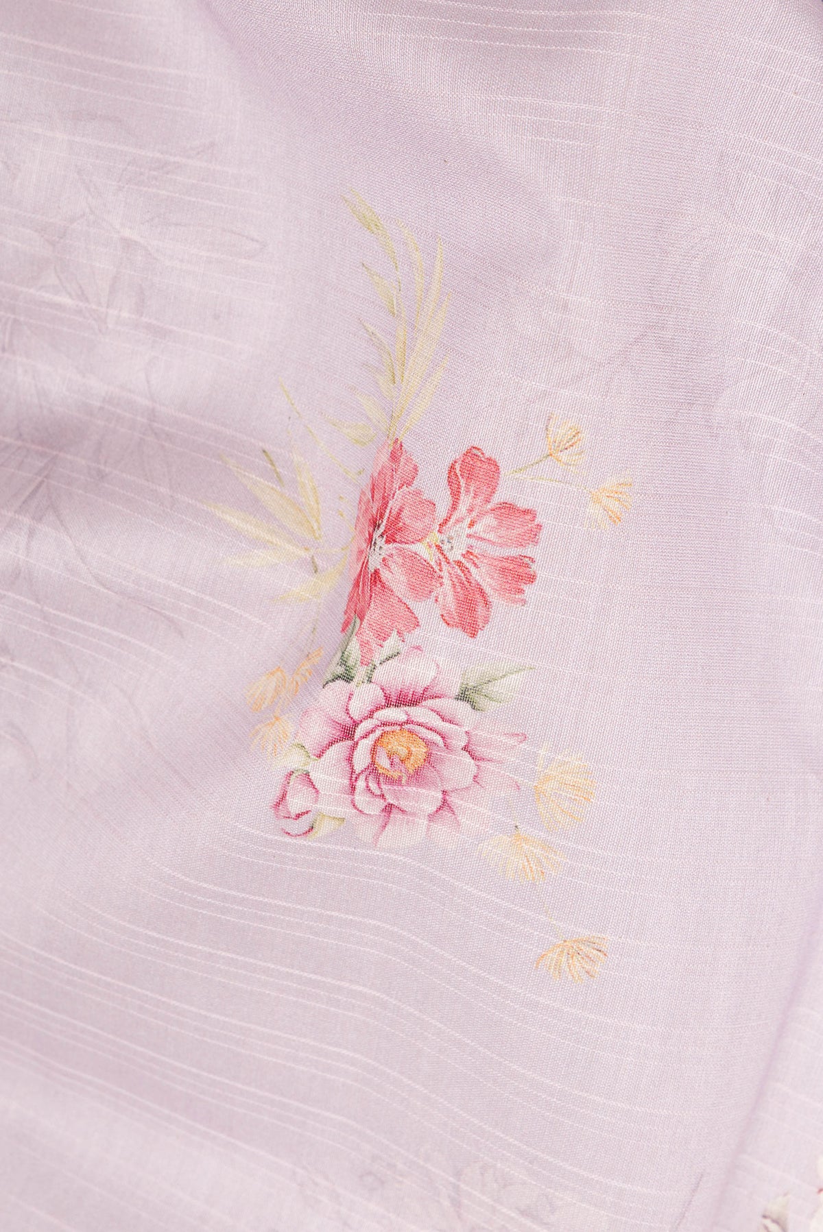 Close up of Pure Silk Lavender Dual Tone Chanderi Saree with Printed design on the body and Zari And Thread Border.  displaying folds