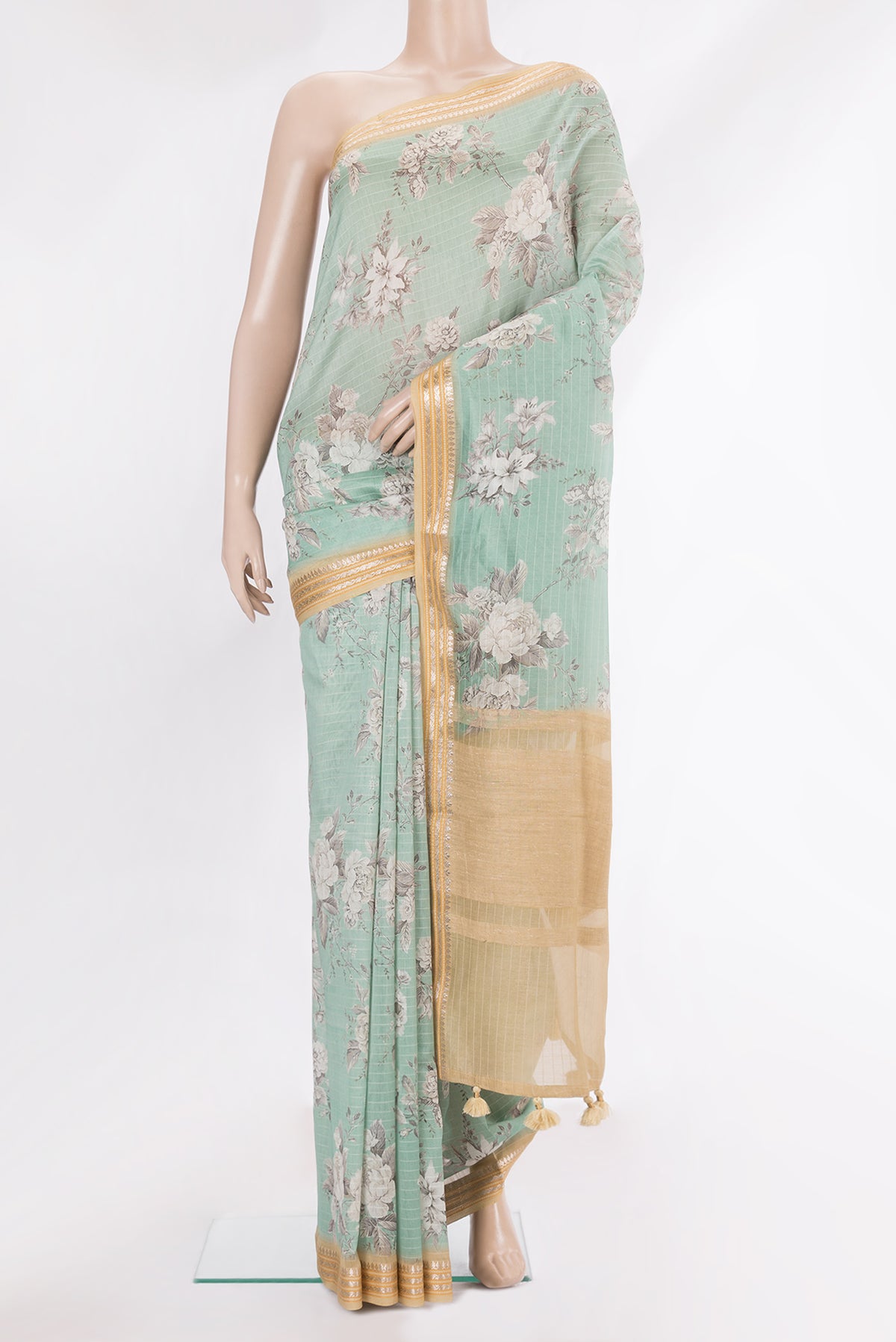Pure Silk Sea Green Dual Tone Chanderi Saree with Printed design on the body and Zari Border.  displayed on a mannequin