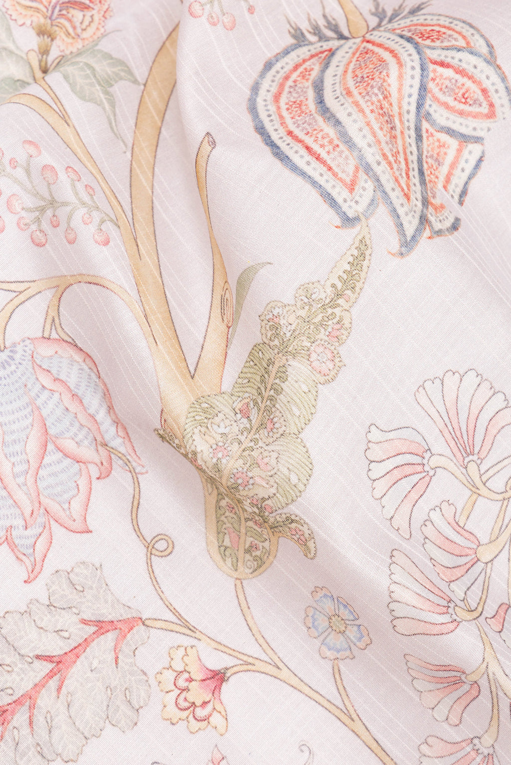 Close up of Beige Chanderi Cotton Saree with Floral Print on the body and Zari And Thread Border.  displaying folds
