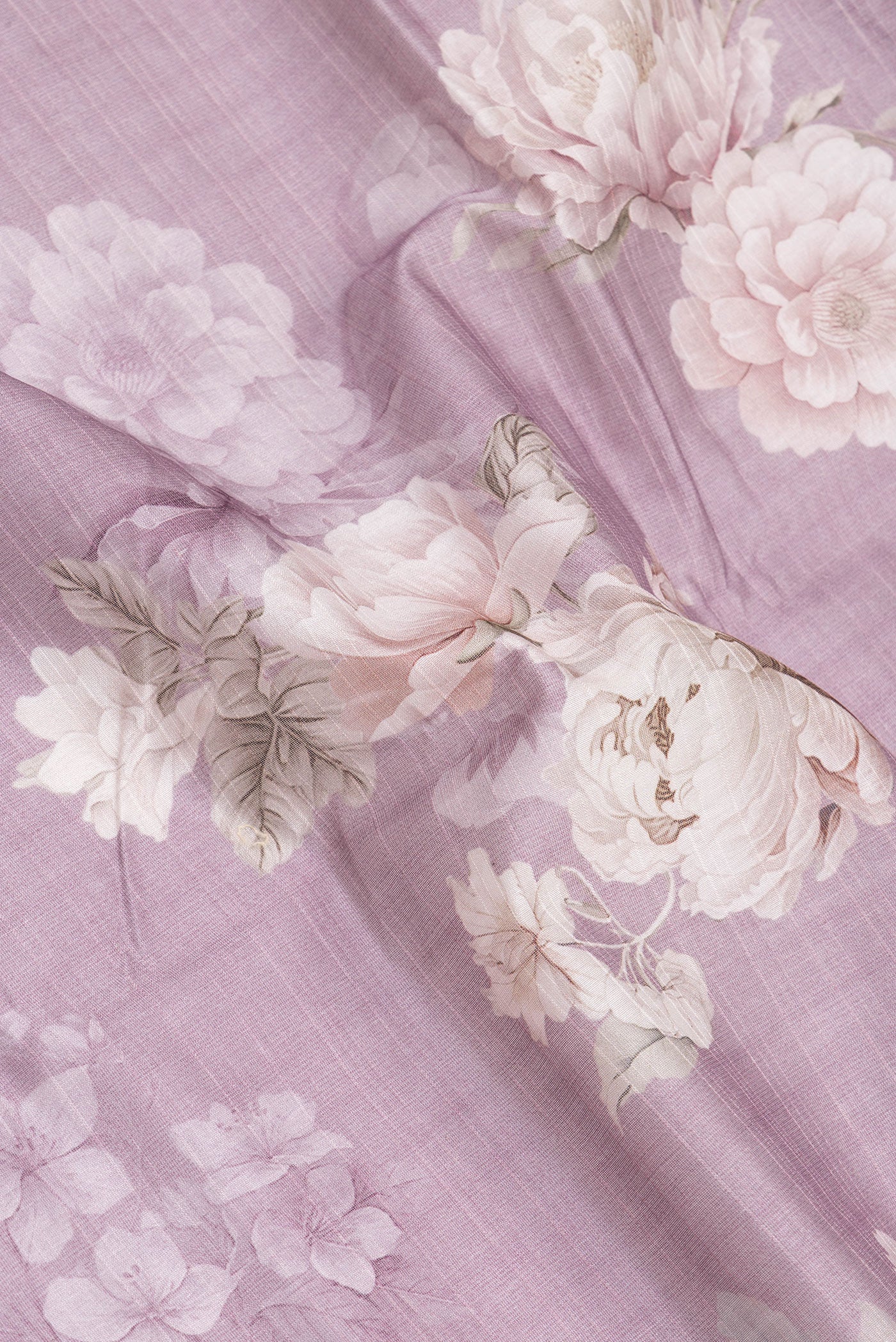 Close up of Purple Dual Tone Chanderi Silk Saree with Printed design on the body and Zari Border.  displaying folds