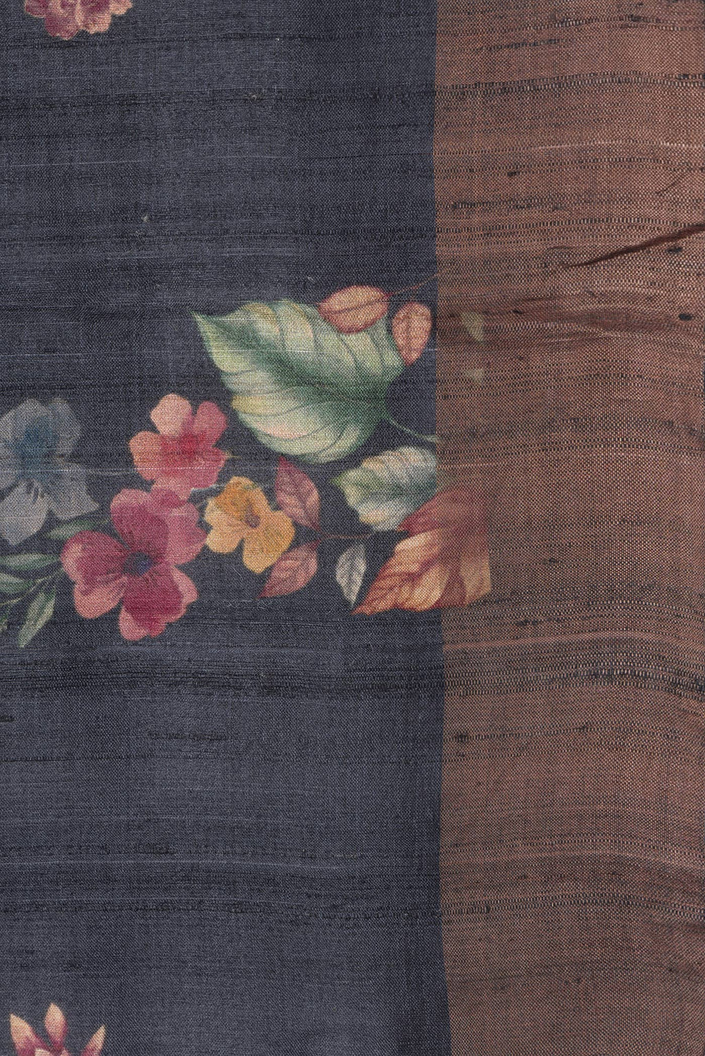 Border image of Black Dual Tone Tussar Silk Saree with Printed design on the body and Zari Border. 