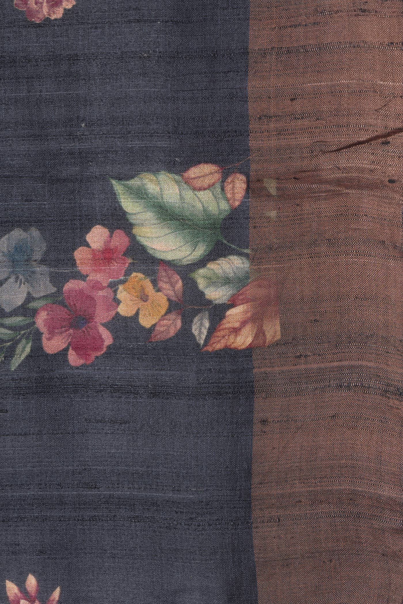 Border image of Black Dual Tone Tussar Silk Saree with Printed design on the body and Zari Border. 