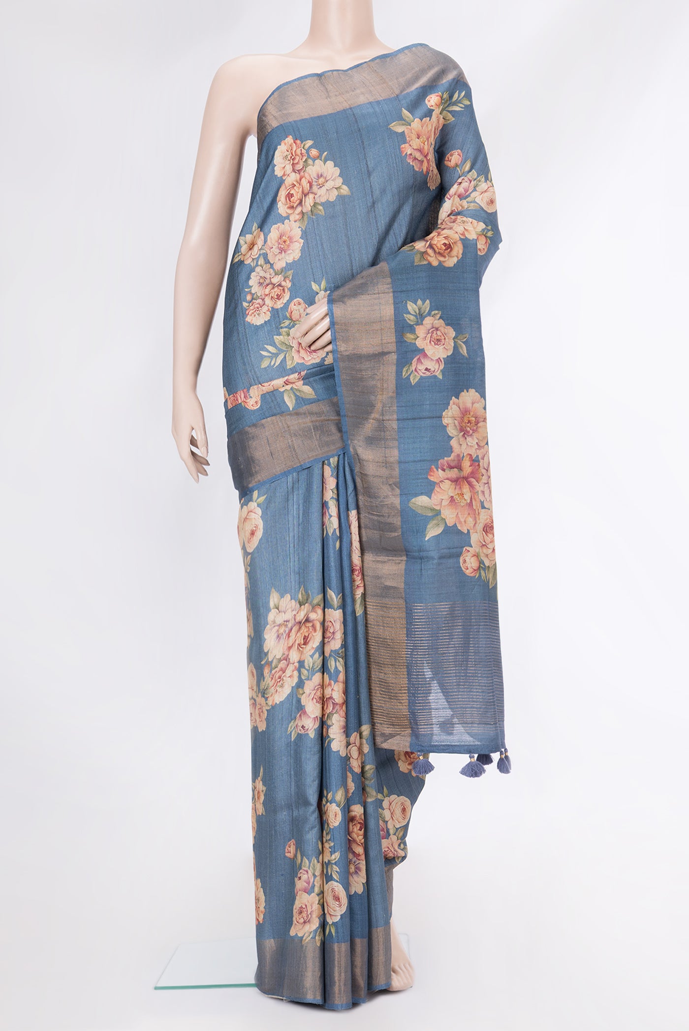 Blue Dual Tone Tussar Silk Saree with Printed design on the body and Zari Border.  displayed on a mannequin