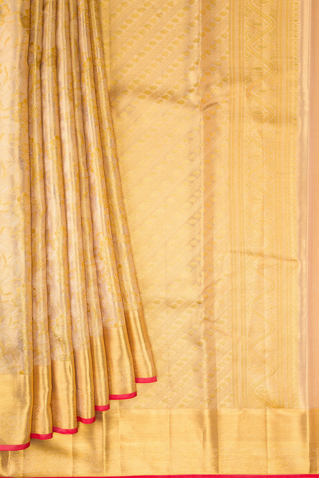 Pleats and pallu of Gold Dual Tone Kanchipuram Tissue Silk Saree with Zari Brocade on the body and Zari Border. 
