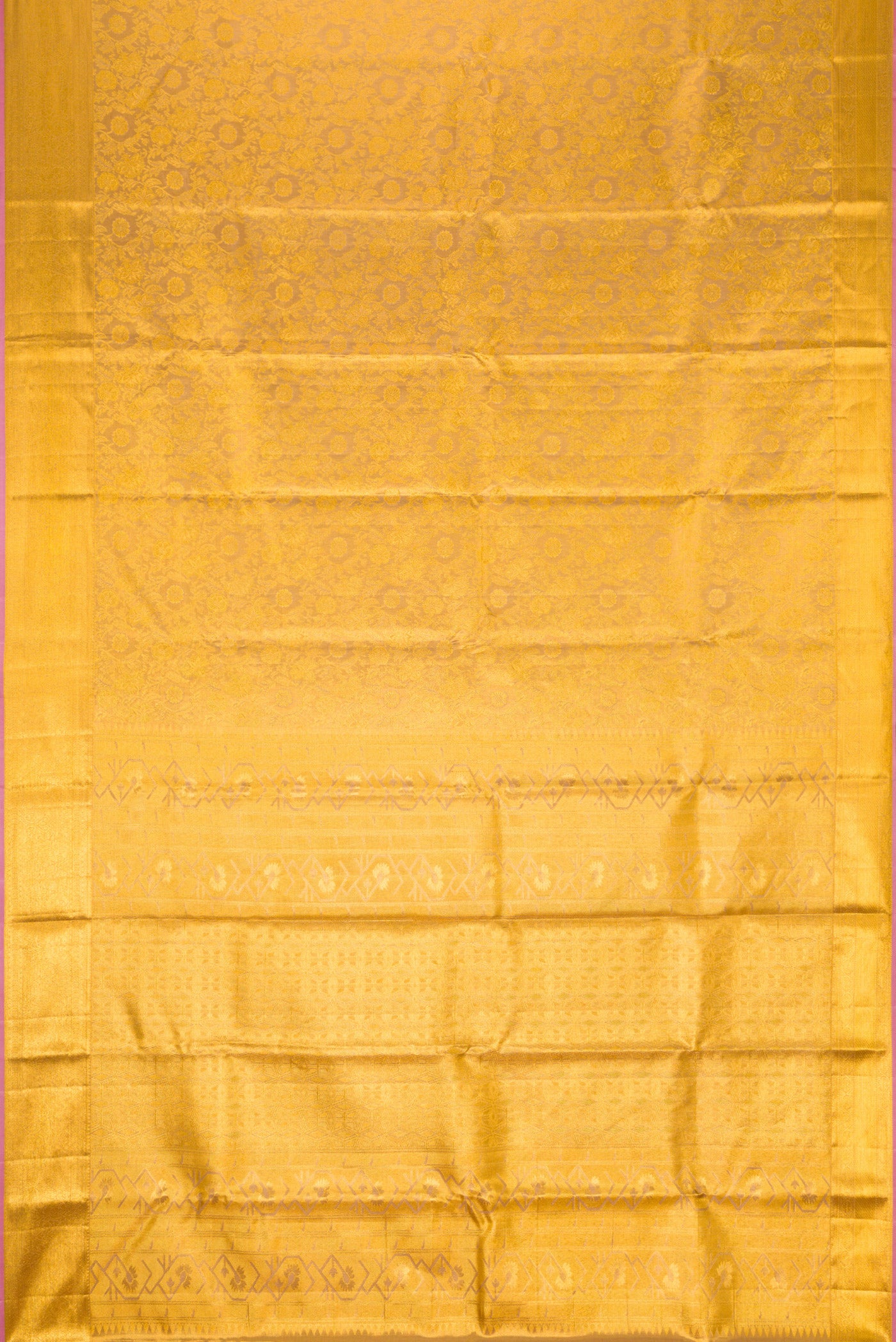 Flat view of Gold Dual Tone Kanchipuram Tissue Silk Saree with Zari Brocade on the body and Zari Border. 
