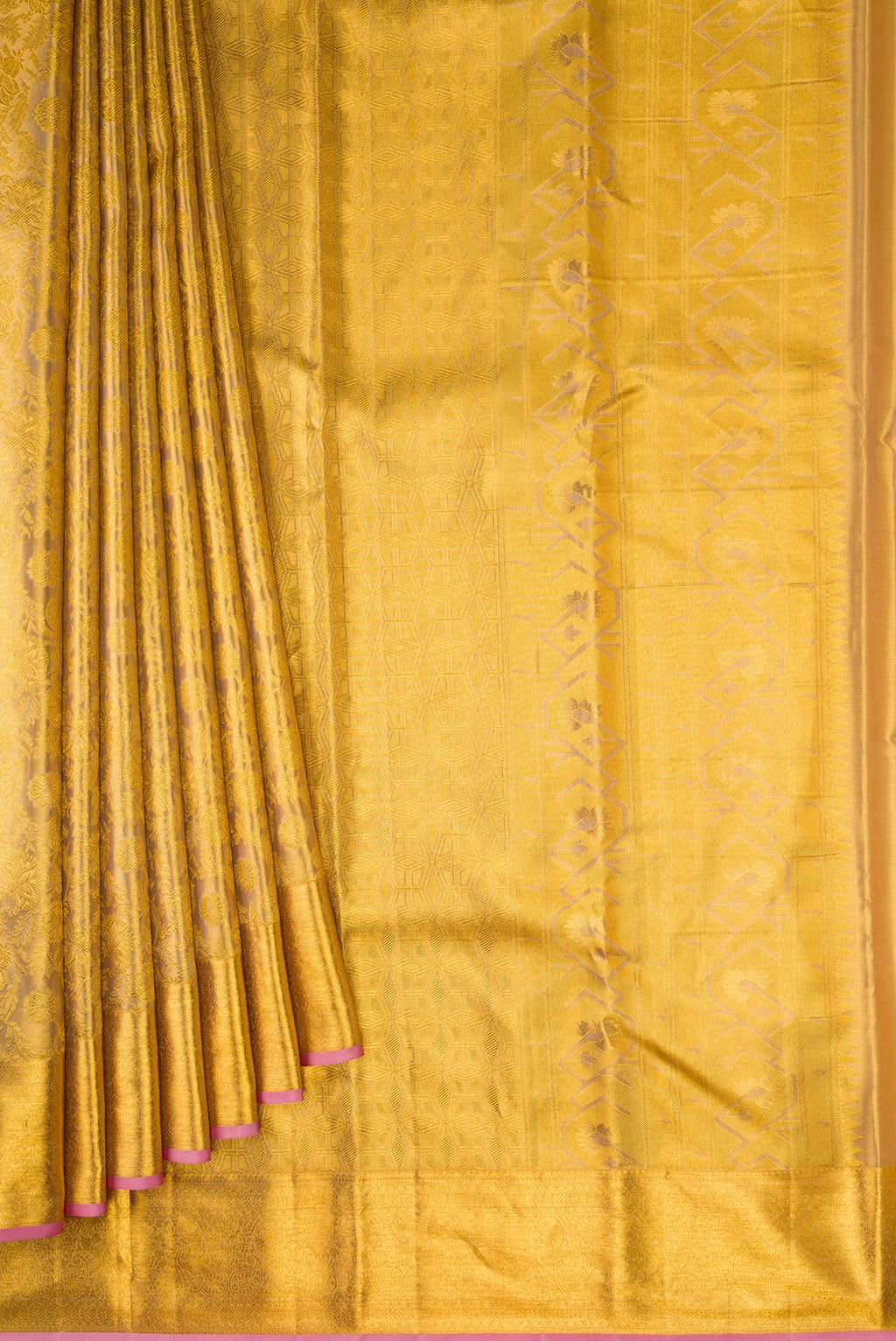 Pleats and pallu of Gold Dual Tone Kanchipuram Tissue Silk Saree with Zari Brocade on the body and Zari Border. 
