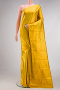 Gold Dual Tone Kanchipuram Tissue Silk Saree with Zari Brocade on the body and Zari Border.  displayed on a mannequin