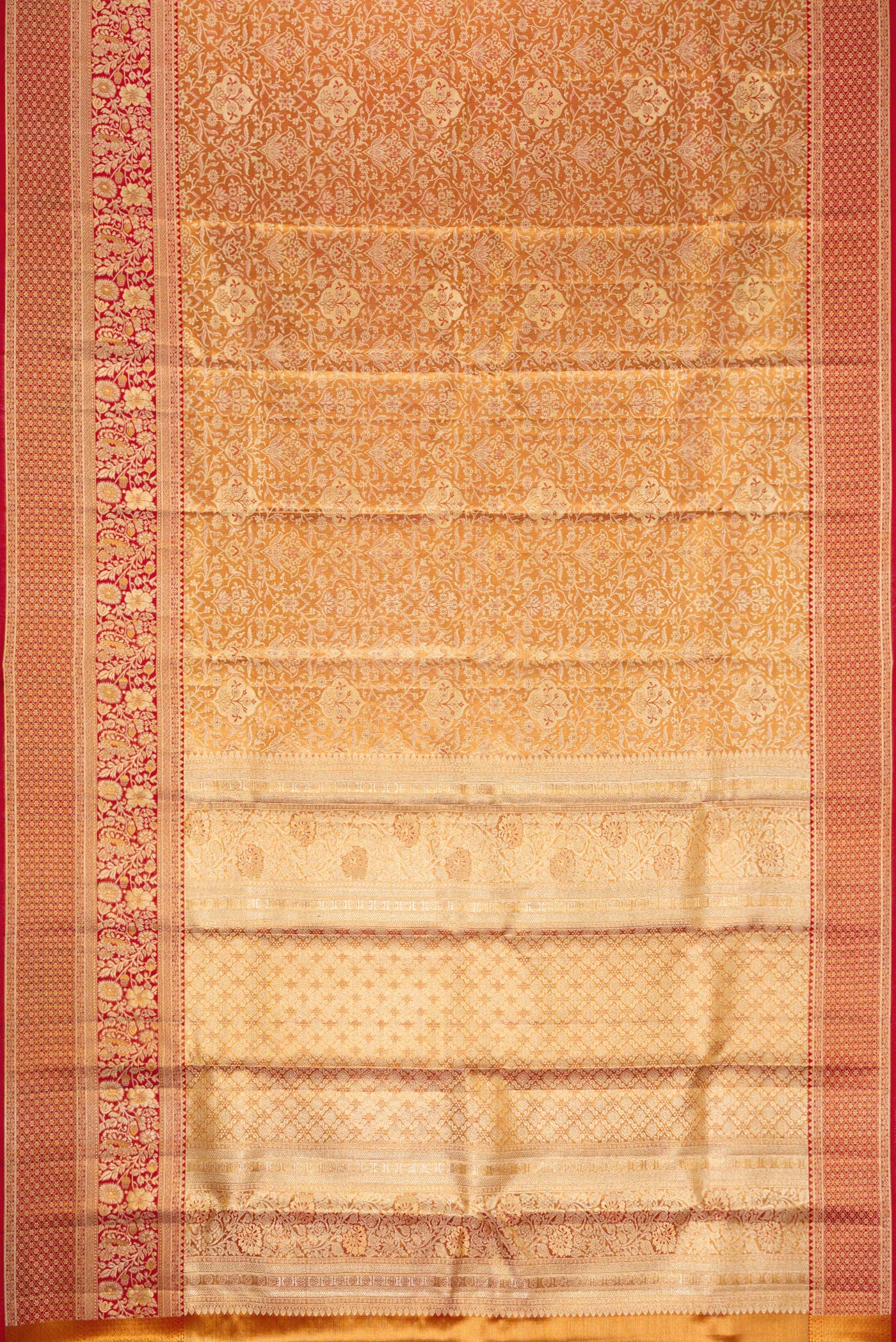 Flat view of Red Dual Tone Kanjivaram Tissue Silk Saree with Zari Brocade on the body and Zari Border. 