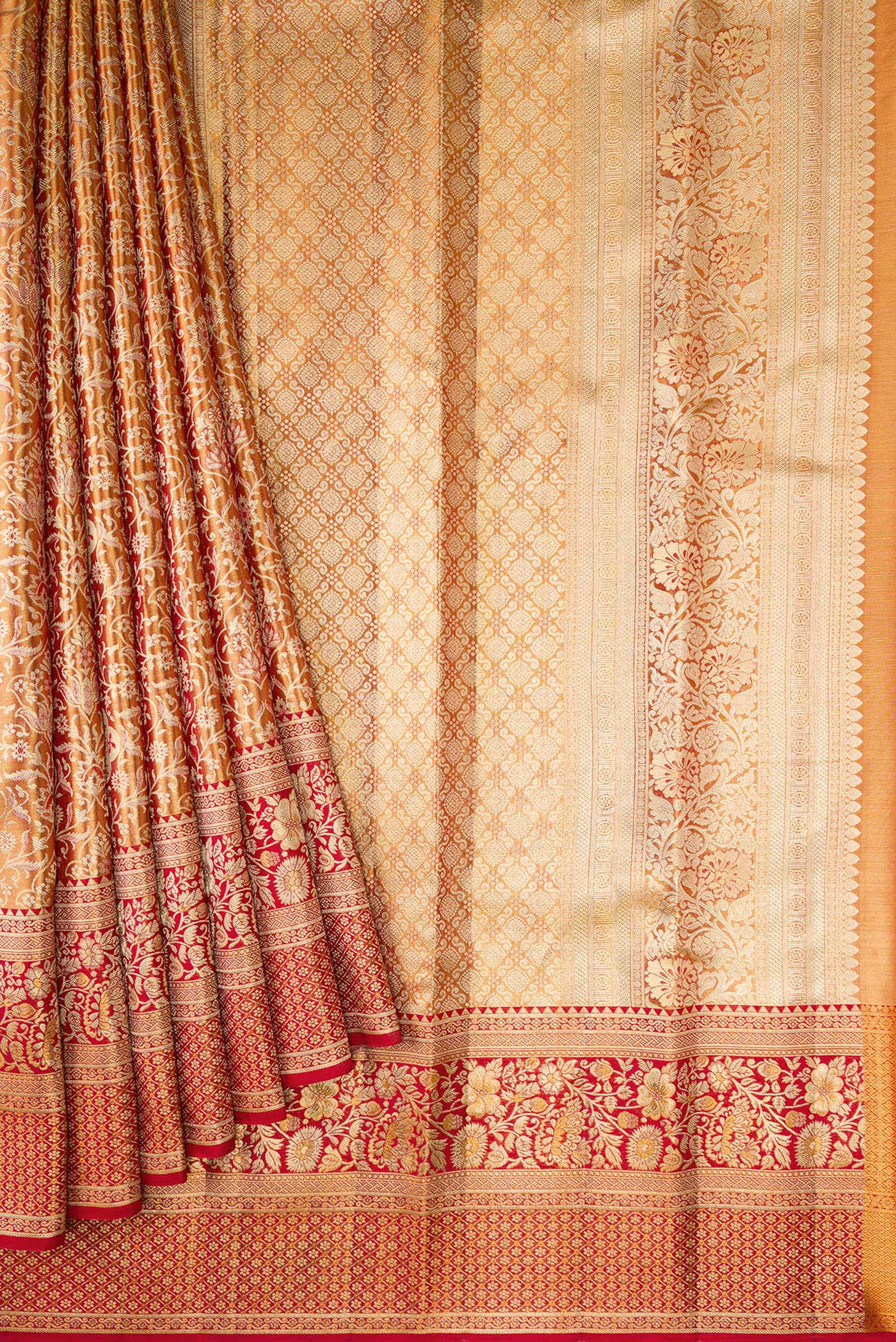 Pleats and pallu of Red Dual Tone Kanjivaram Tissue Silk Saree with Zari Brocade on the body and Zari Border. 