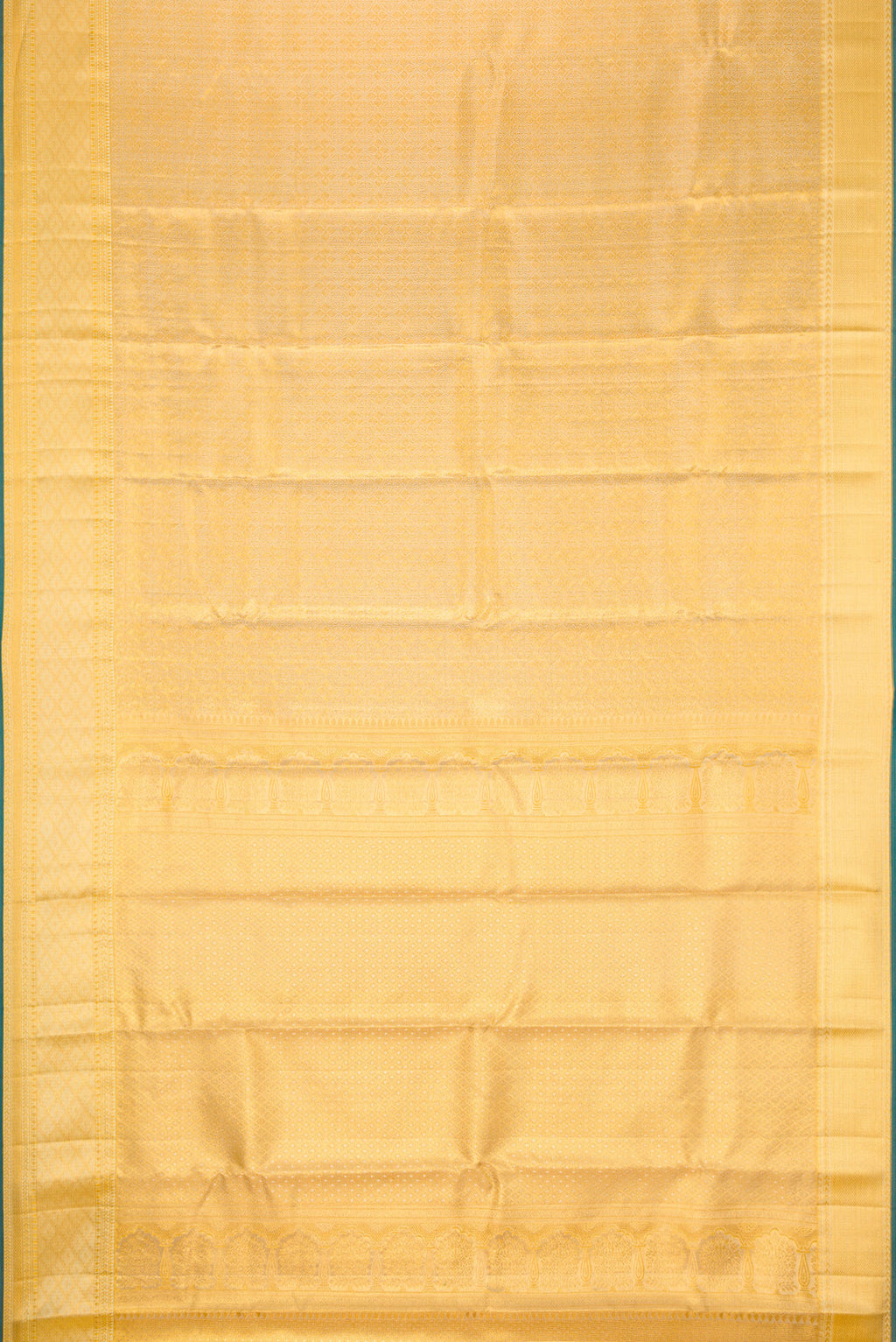 Flat view of Gold Dual Tone Kanjivaram Tissue Silk Saree with Zari Brocade on the body and Zari Border. 