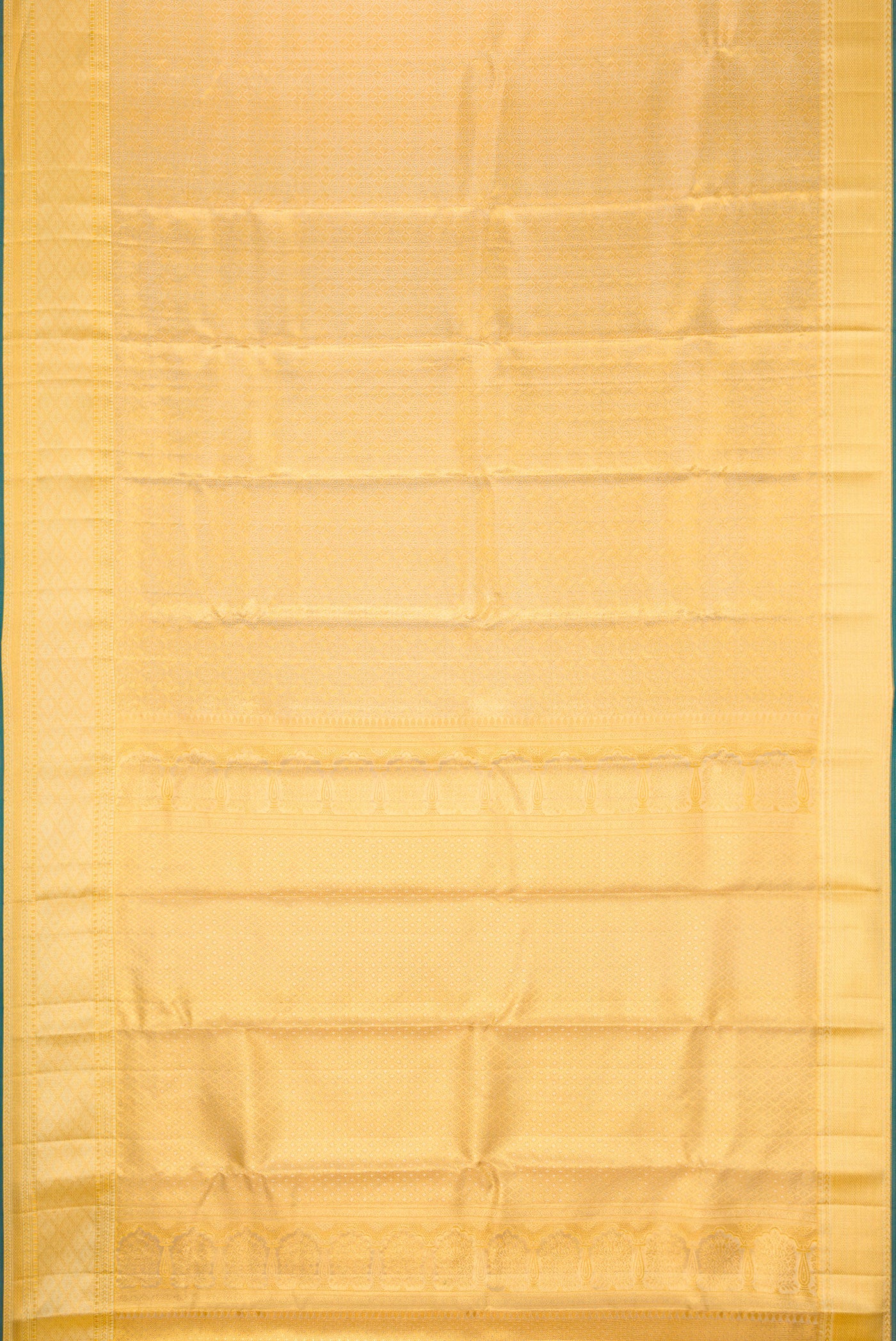Flat view of Gold Dual Tone Kanjivaram Tissue Silk Saree with Zari Brocade on the body and Zari Border. 