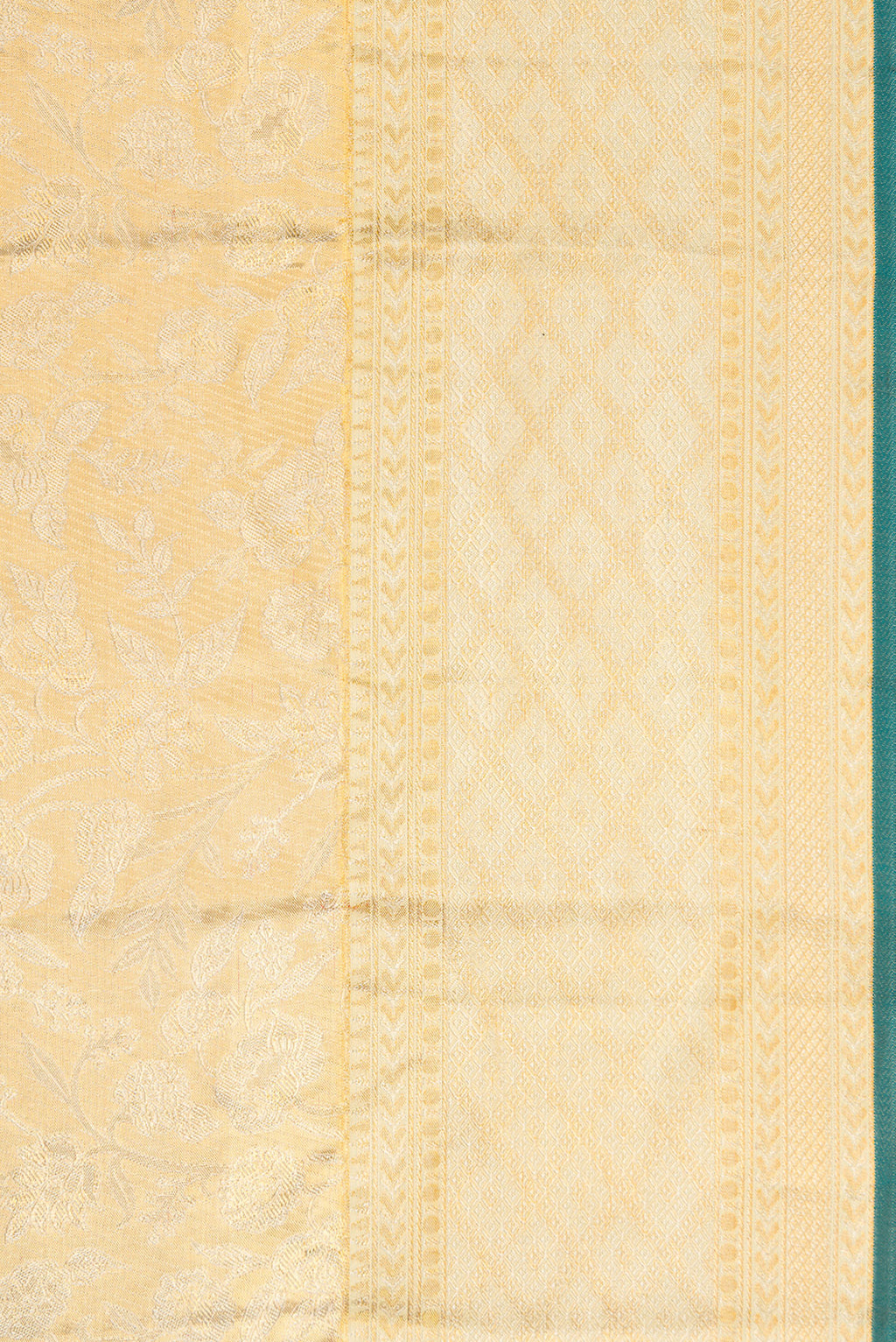 Border image of Gold Dual Tone Kanjivaram Tissue Silk Saree with Zari Butta on the body and Zari Border. 