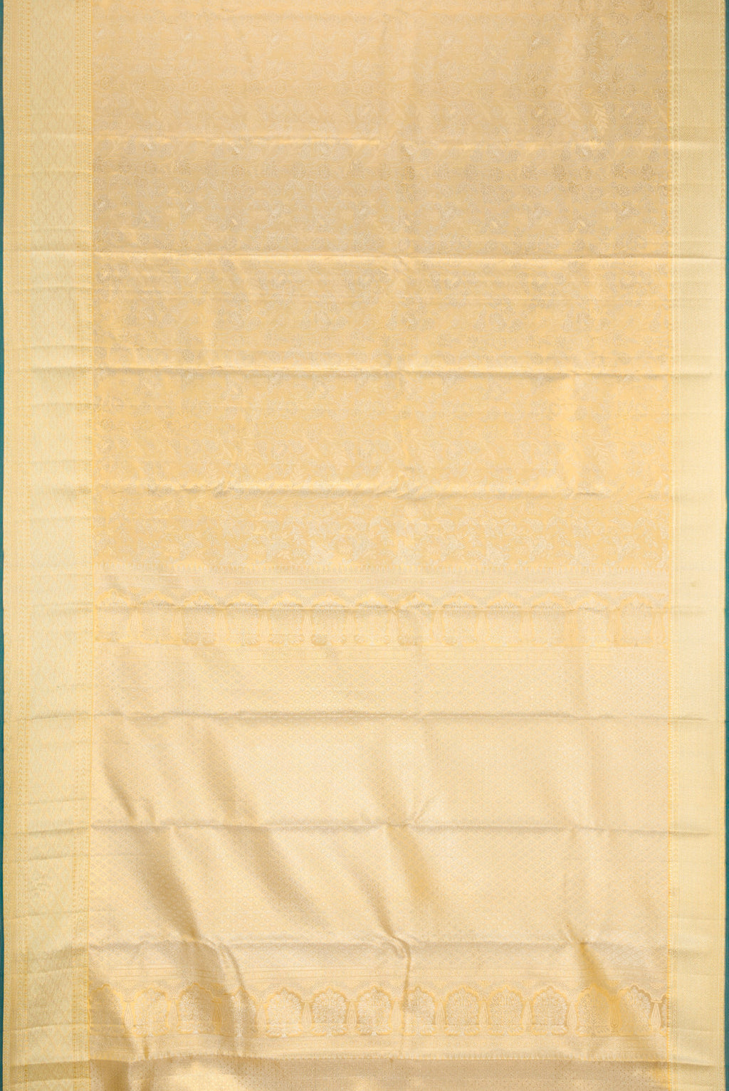 Flat view of Gold Dual Tone Kanjivaram Tissue Silk Saree with Zari Butta on the body and Zari Border. 