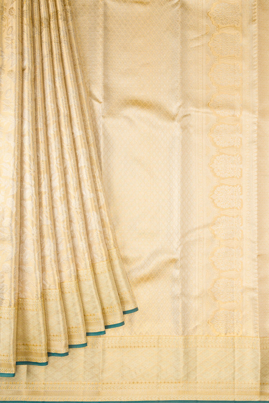 Pleats and pallu of Gold Dual Tone Kanjivaram Tissue Silk Saree with Zari Butta on the body and Zari Border. 