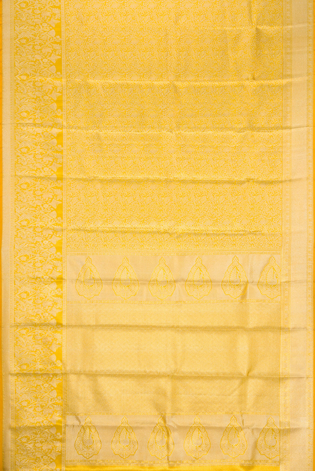 Flat view of Gold Dual Tone Kanjivaram Tissue Silk Saree with Zari Brocade on the body and Zari Border. 