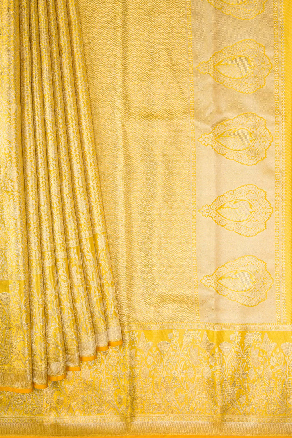 Pleats and pallu of Gold Dual Tone Kanjivaram Tissue Silk Saree with Zari Brocade on the body and Zari Border. 
