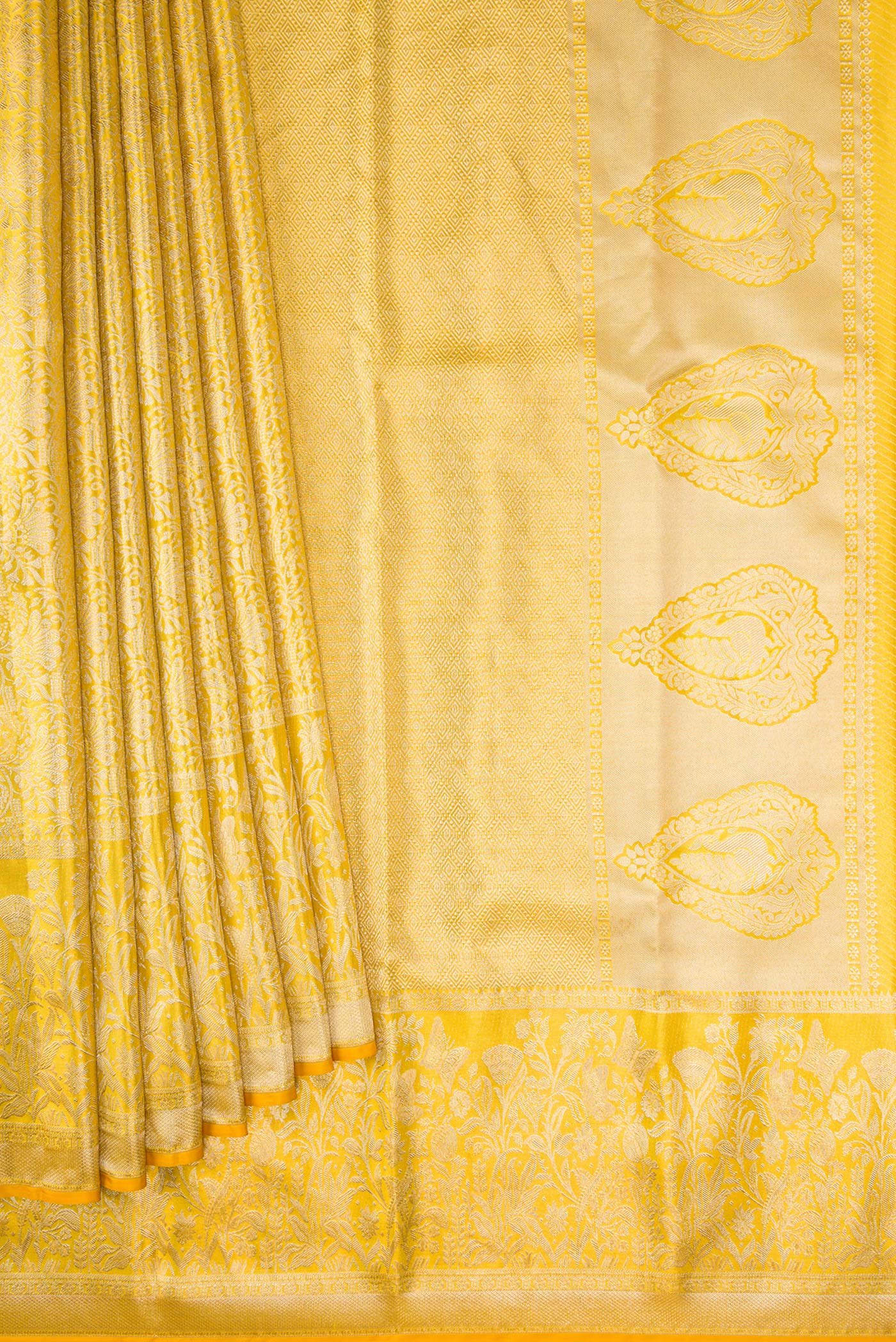 Pleats and pallu of Gold Dual Tone Kanjivaram Tissue Silk Saree with Zari Brocade on the body and Zari Border. 