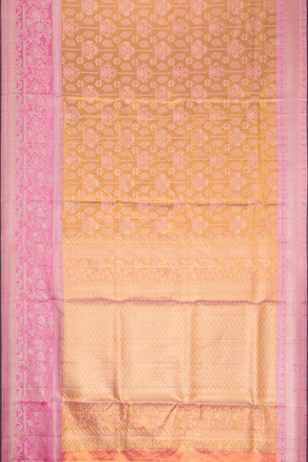 Flat view of Gold Dual Tone Kanjivaram Tissue Silk Saree with Zari Brocade on the body and Zari Border. 