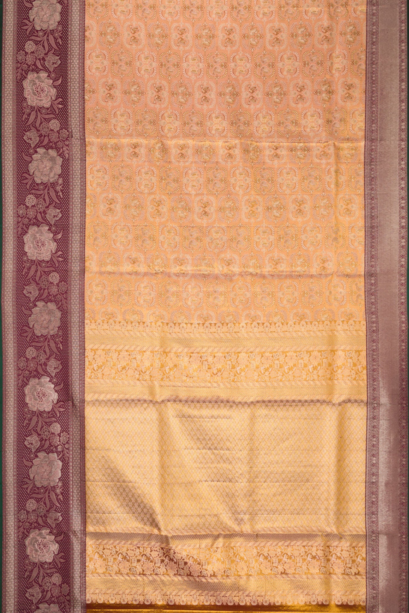 Flat view of Gold Dual Tone Kanjivaram Tissue Silk Saree with Zari Brocade on the body and Zari Border. 