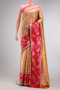 Gold Dual Tone Kanjivaram Tissue Silk Saree with Zari Brocade on the body and Fancy Border.  displayed on a mannequin