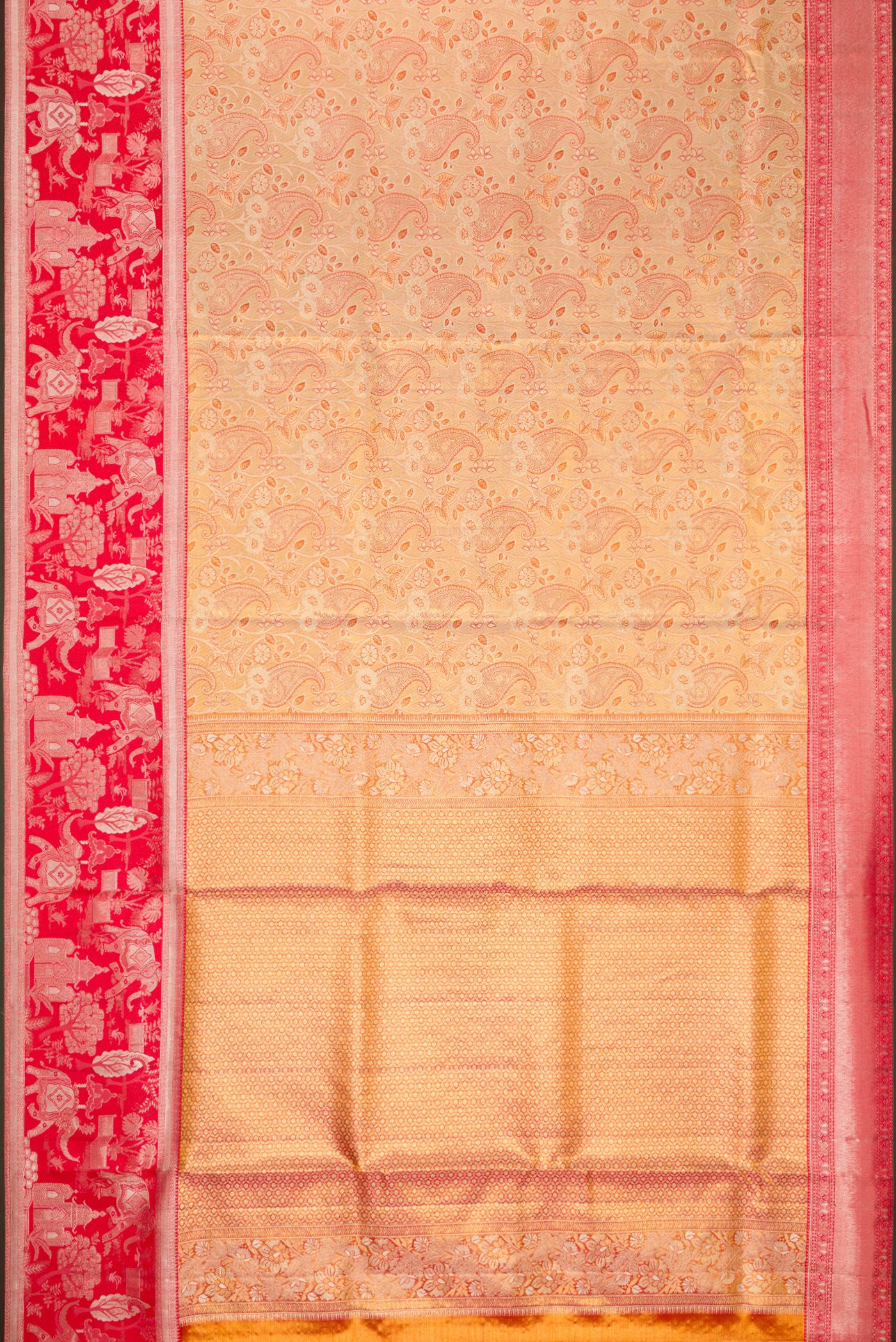 Flat view of Gold Dual Tone Kanjivaram Tissue Silk Saree with Zari Brocade on the body and Fancy Border. 