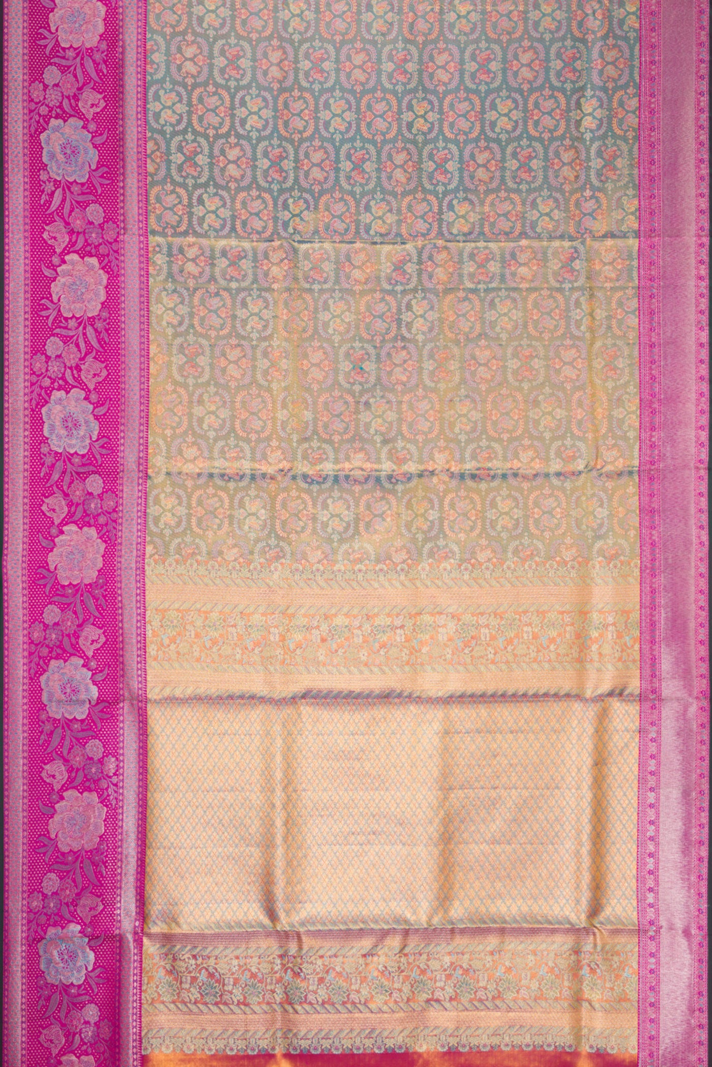 Flat view of Blue Dual Tone Kanjivaram Tissue Silk Saree with Zari Brocade on the body and Zari Border. 