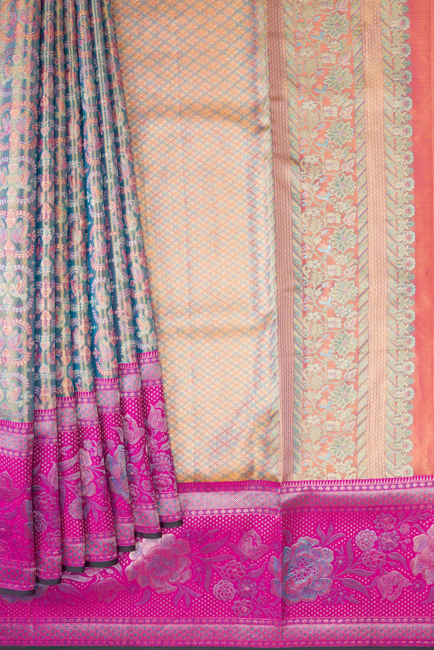 Pleats and pallu of Blue Dual Tone Kanjivaram Tissue Silk Saree with Zari Brocade on the body and Zari Border. 