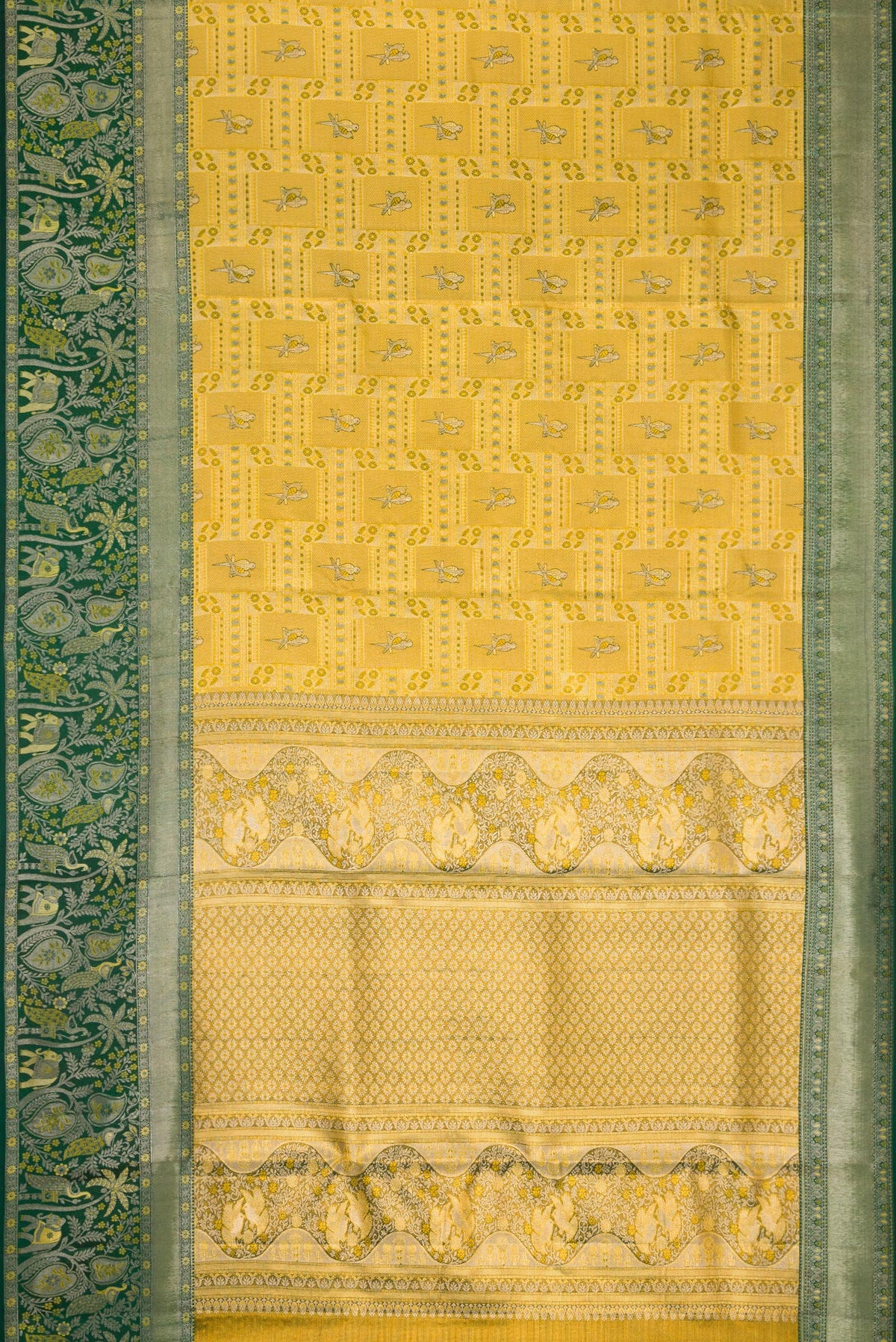 Flat view of Gold Dual Tone Kanjivaram Tissue Silk Saree with Zari Brocade on the body and Zari Border. 
