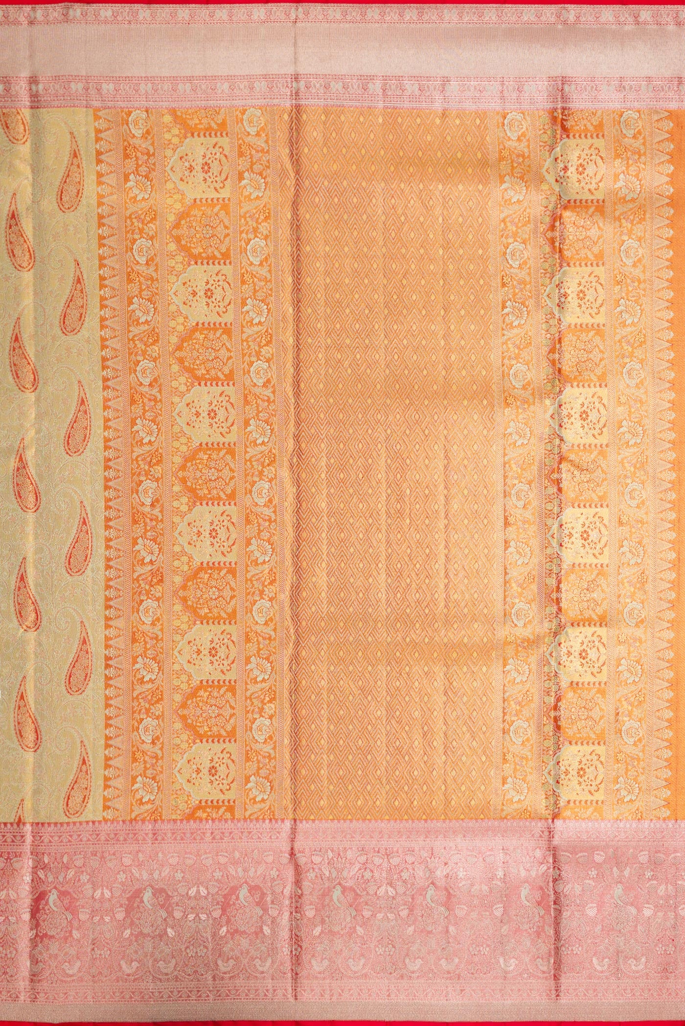 Close up image of the pallu of Pista Green Dual Tone Kanjivaram Tissue Silk Saree with Zari Brocade on the body and Zari Border. 
