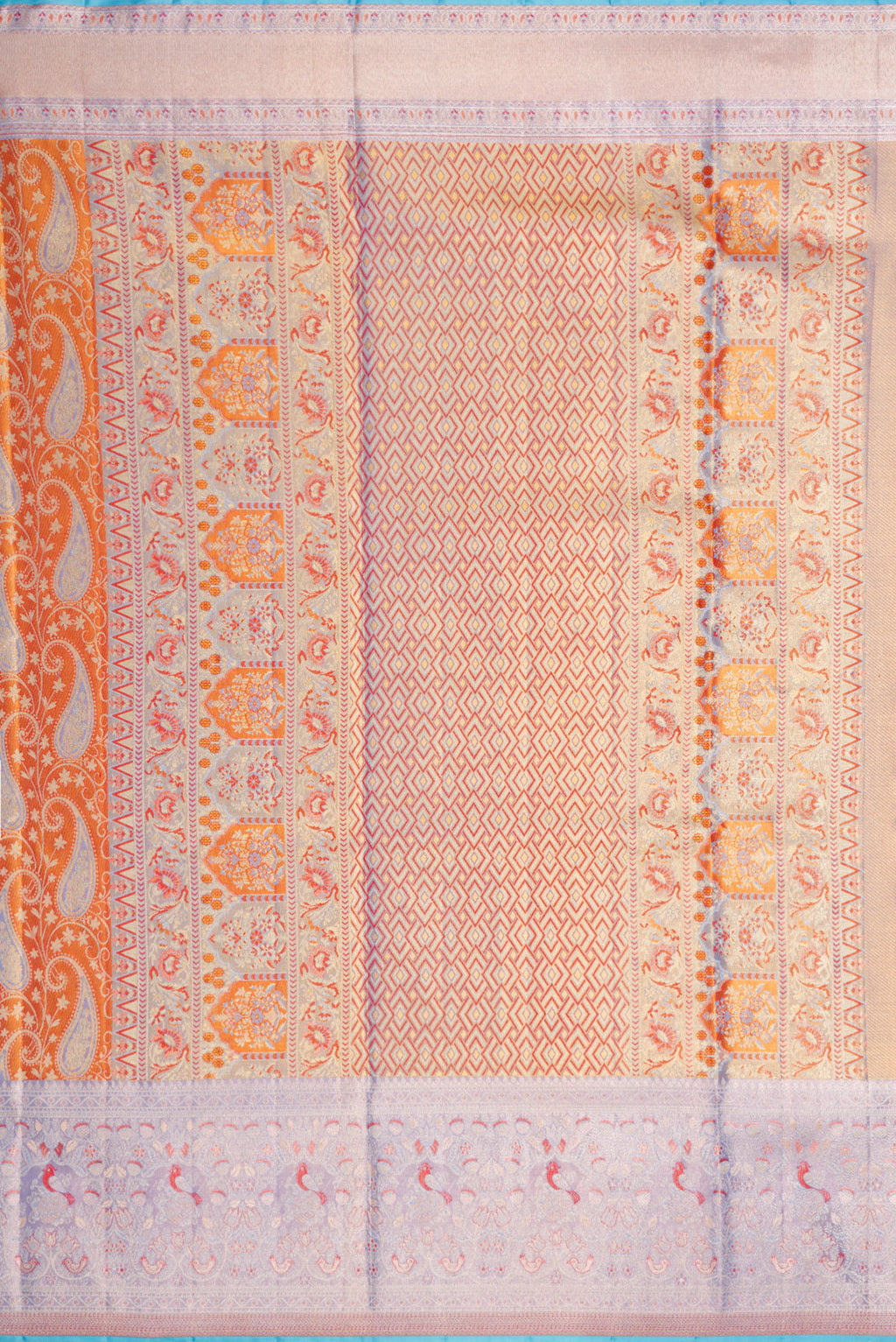 Close up image of the pallu of Orange Dual Tone Kanjivaram Tissue Silk Saree with Zari Brocade on the body and Fancy Border. 