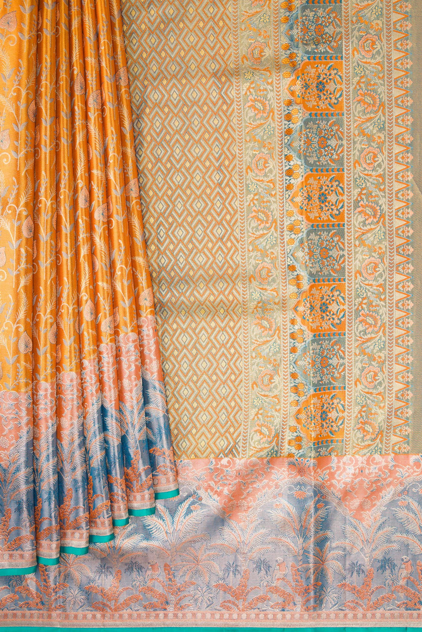 Pleats and pallu of Gold Dual Tone Kanjivaram Tissue Silk Saree with Zari Brocade on the body and Fancy Border. 