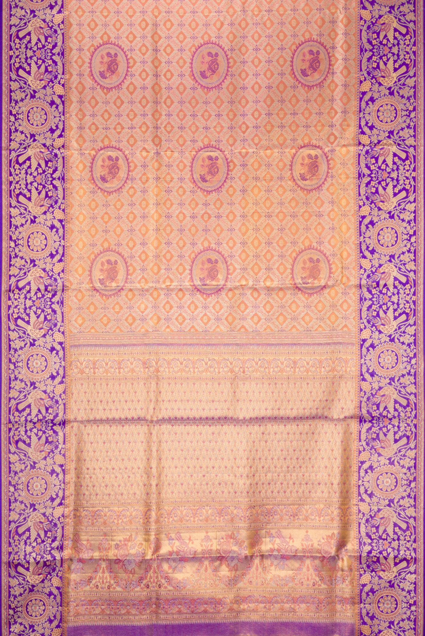 Flat view of Peach Dual Tone Kanjivaram Tissue Silk Saree with Zari Brocade on the body and Fancy Border. 
