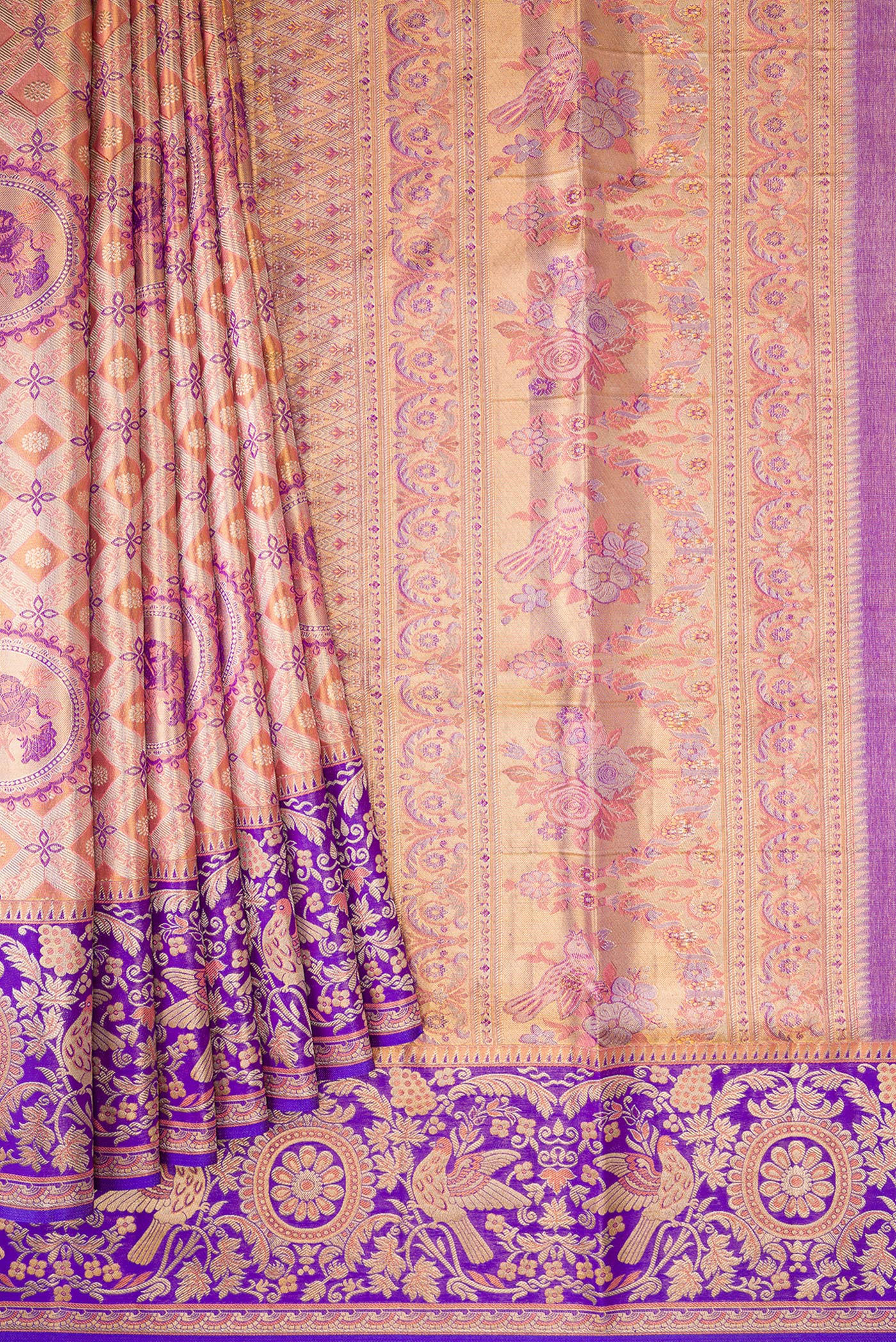 Pleats and pallu of Peach Dual Tone Kanjivaram Tissue Silk Saree with Zari Brocade on the body and Fancy Border. 