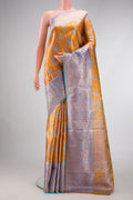 Orange Dual Tone Kanjivaram Tissue Silk Saree with Zari Brocade on the body and Zari Border.  displayed on a mannequin