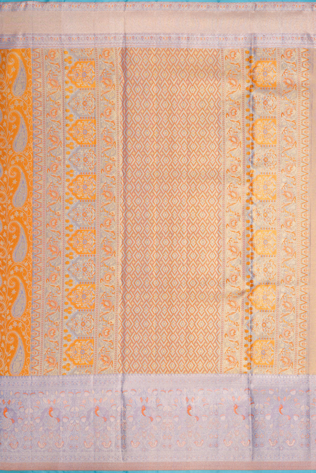 Close up image of the pallu of Orange Dual Tone Kanjivaram Tissue Silk Saree with Zari Brocade on the body and Zari Border. 