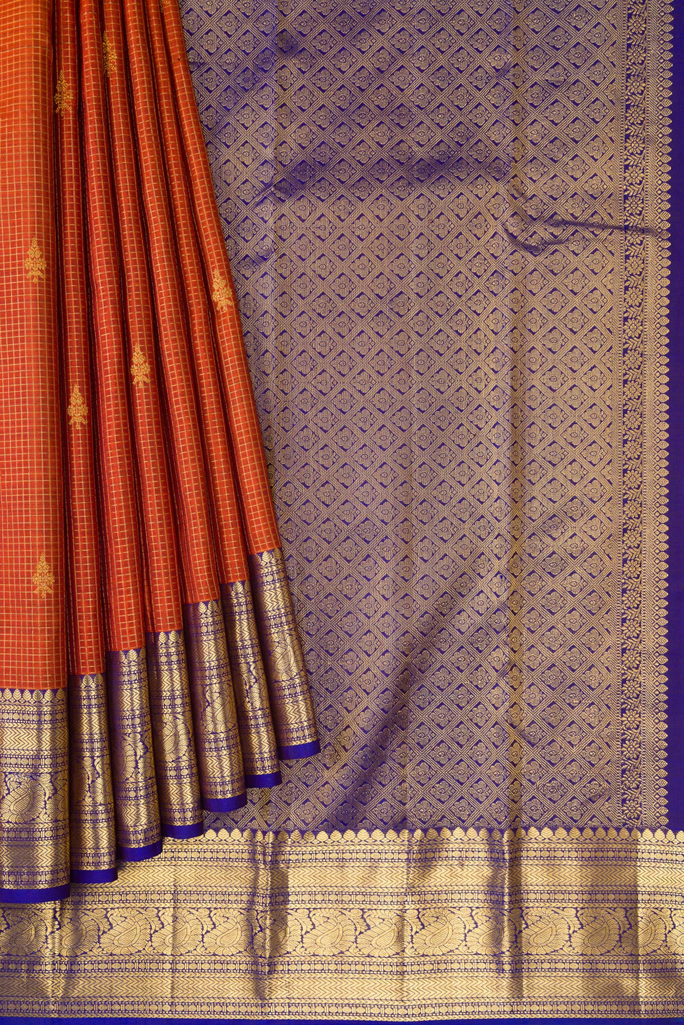 Pleats and pallu of Orange Dual Tone Kanchipuram Silk Saree with Checked design on the body and Zari Border. 