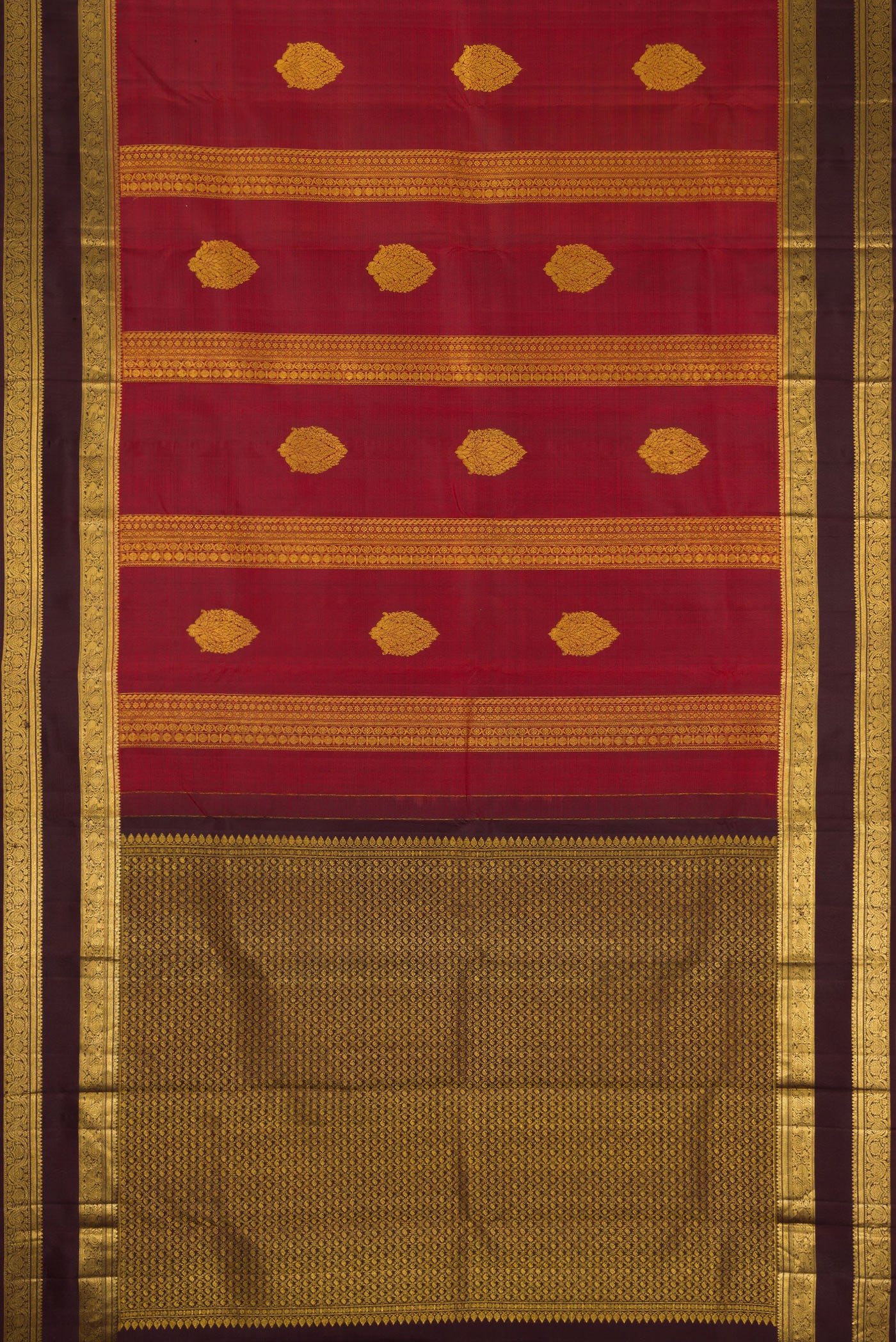 Flat view of Maroon Kanchipuram Silk Saree with Stripes on the body and Zari Border. 