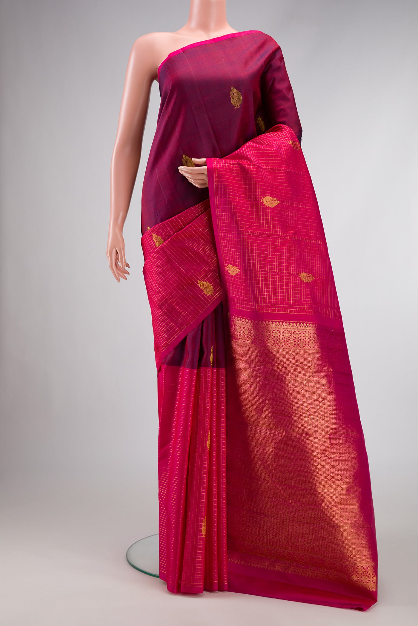 Burgundy and Pink Color Kanchipuram Silk Saree with Half And Half on the body and Without Border.  displayed on a mannequin